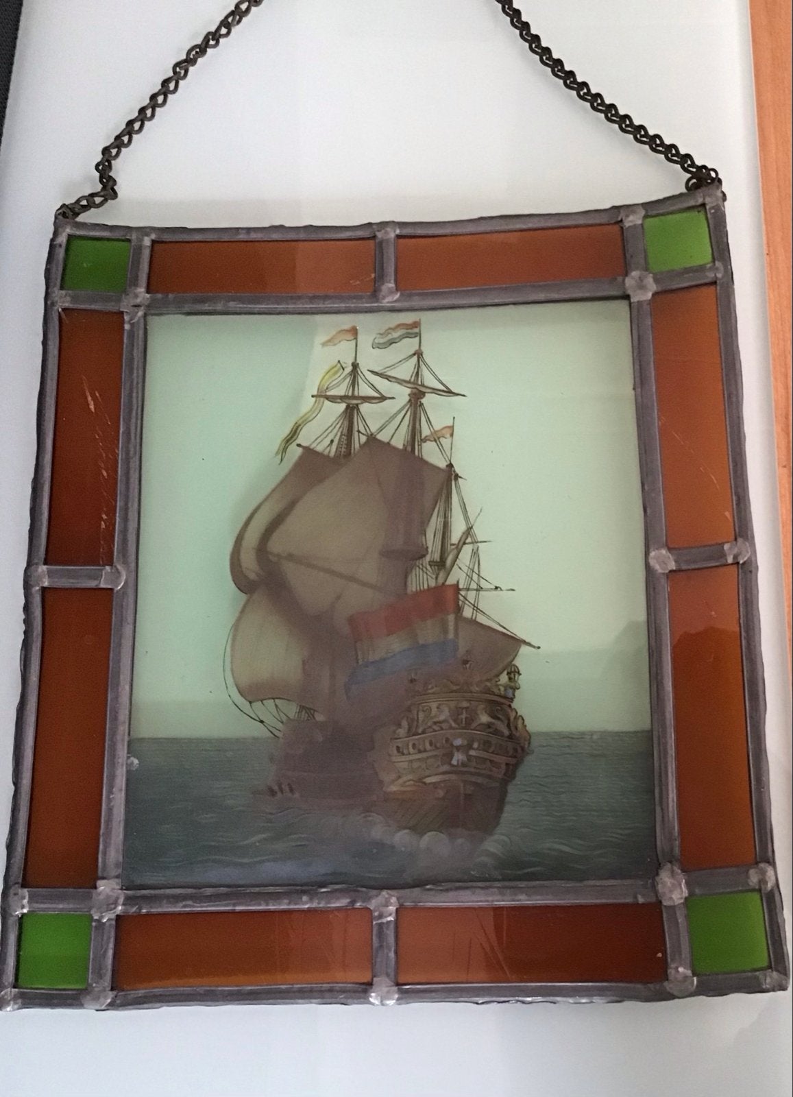 Glas-in-lood paneel met VOC-schip, Ophalen