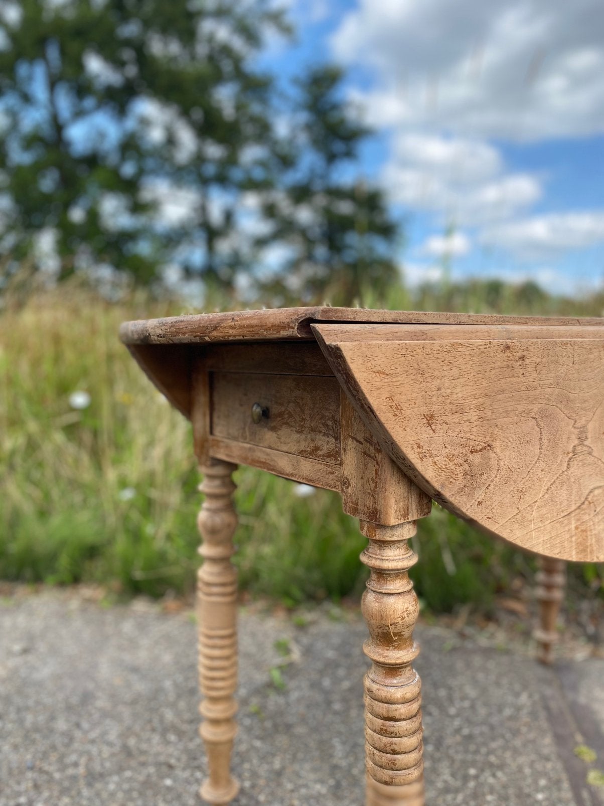 Ovale teakhouten hangoortafel, Ophalen