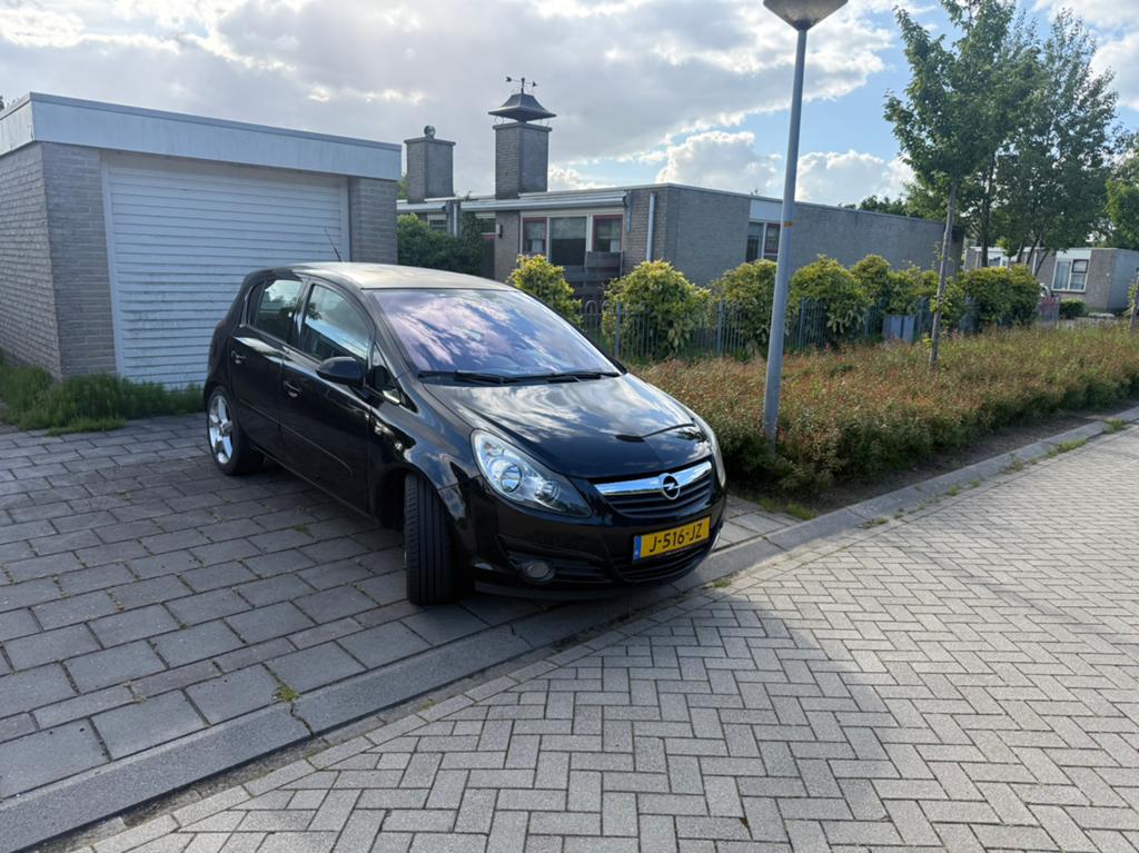 Opel Corsa 1.2 16V 5D 2007 Zwart, Auto's, Opel, Voorwielaandrijving, 4 cilinders, 1229 cc, Bedrijf