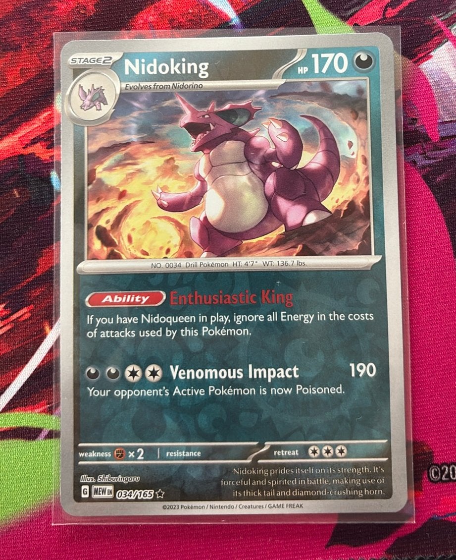 Nidoking  MEW034/165 reverse holo, Ophalen of Verzenden, Zo goed als nieuw