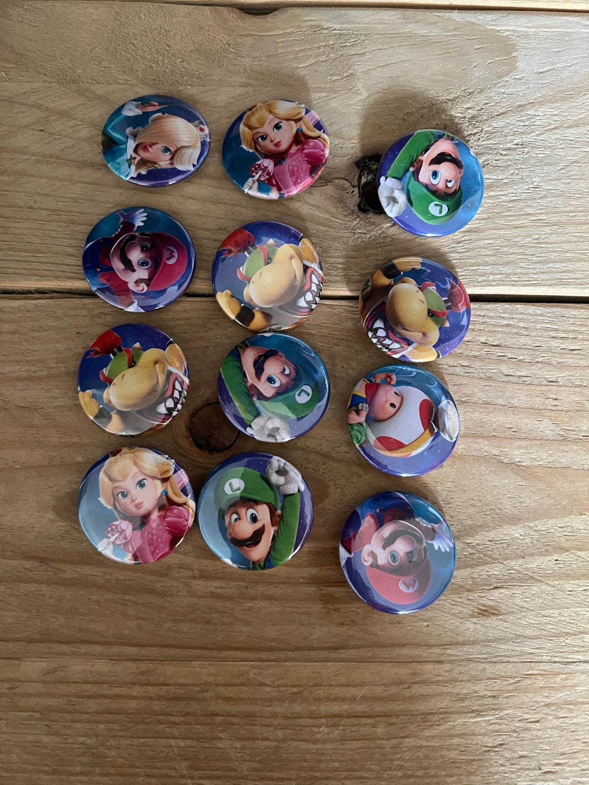 Super Mario Bros. Buttons - Set van 12, Ophalen of Verzenden, Zo goed als nieuw, Figuurtje, Button