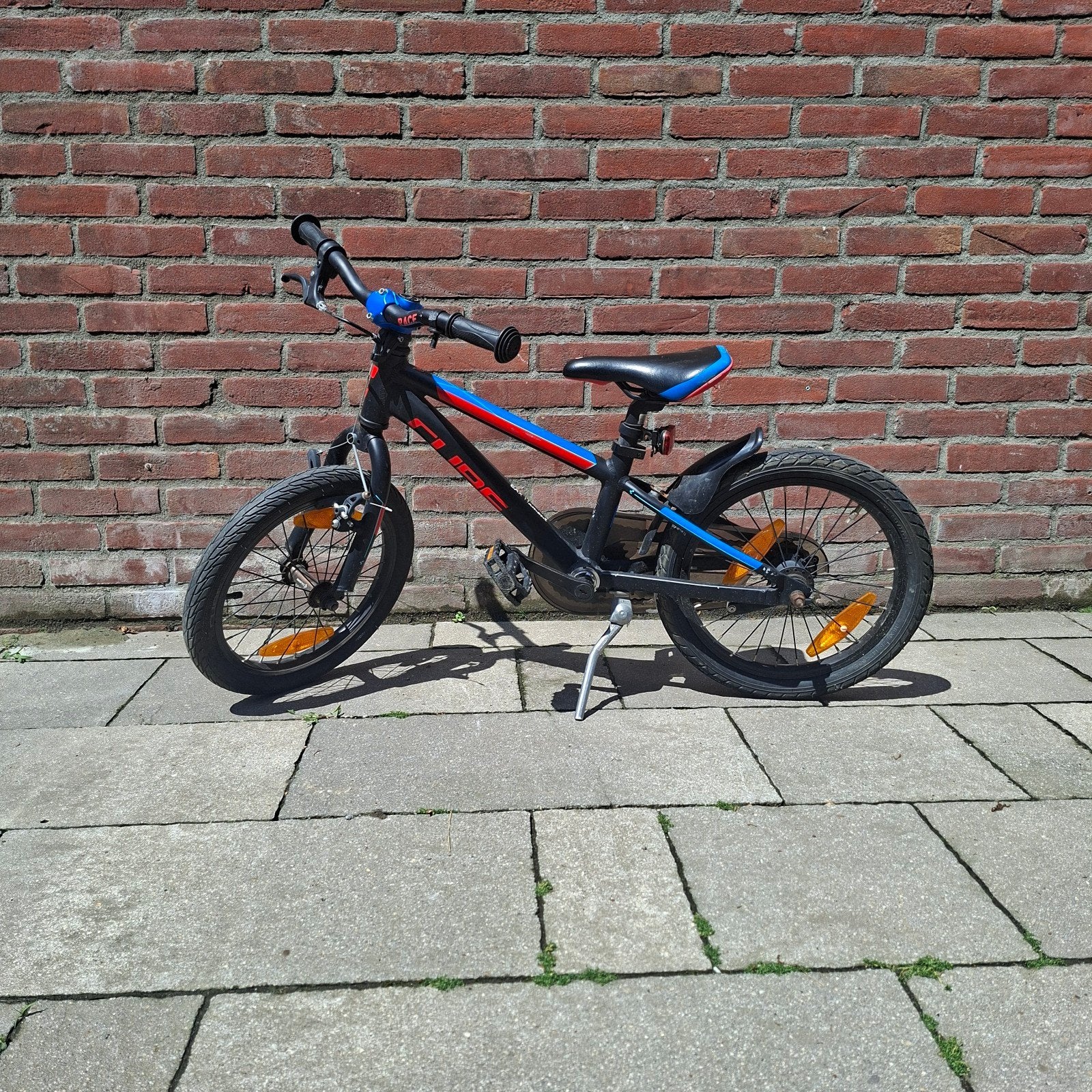 Cube Race 160 kinderfiets - Zwart/Blauw/Rood, Ophalen