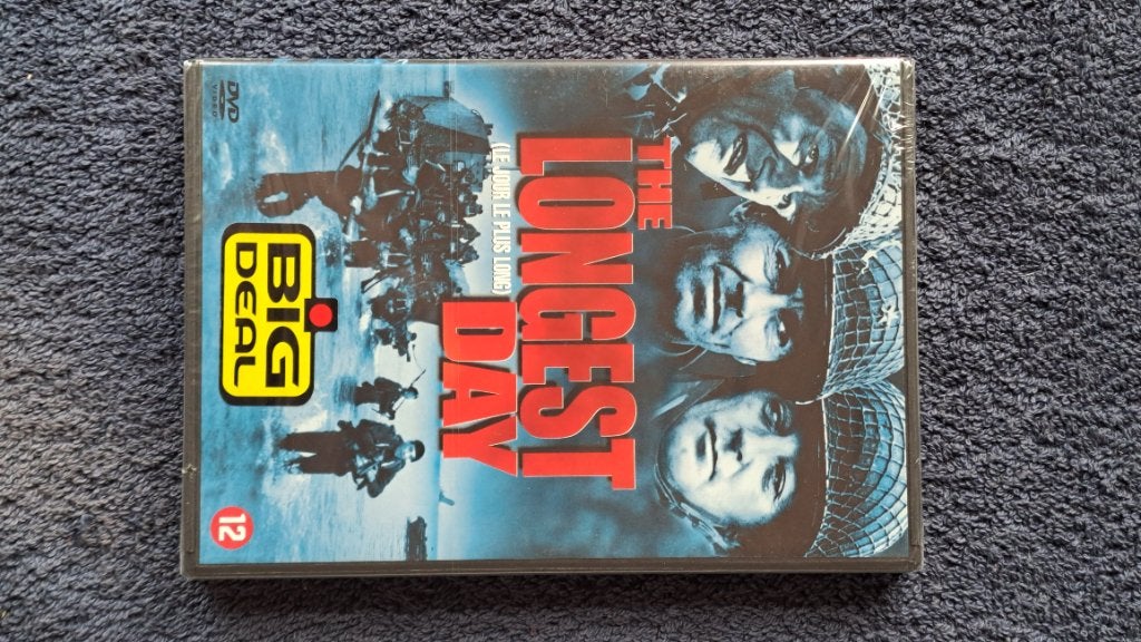 The Longest Day "John Wayne, Clint Eastwood", 1960 tot 1980, Ophalen of Verzenden, Zo goed als nieuw, Actie en Avontuur