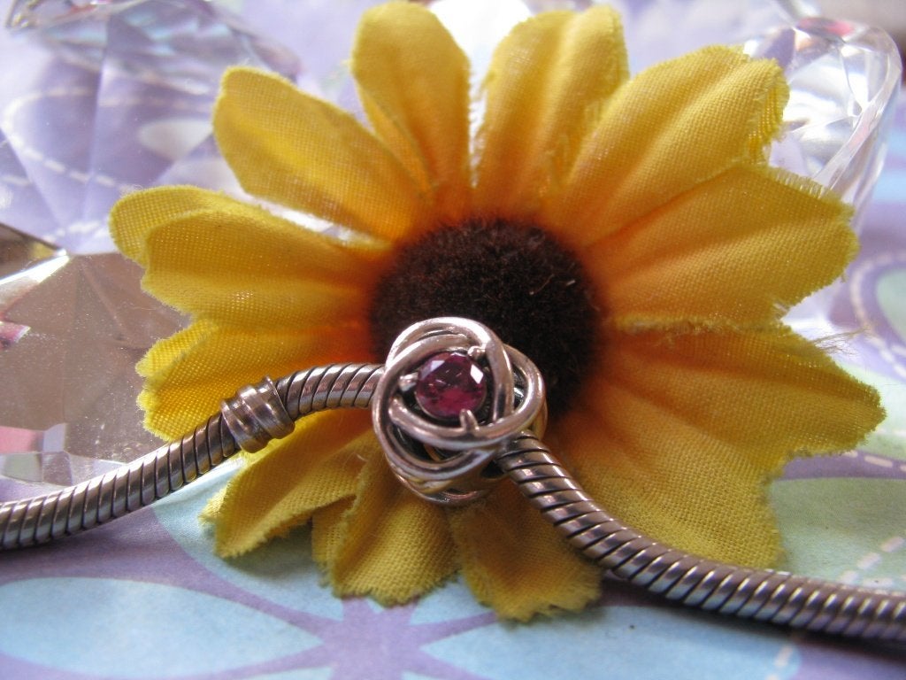 Pandora bedel 790065C05 = oneindige knoop + kristal ROZE, Pandora, Ophalen of Verzenden, Zo goed als nieuw, 1 bedel