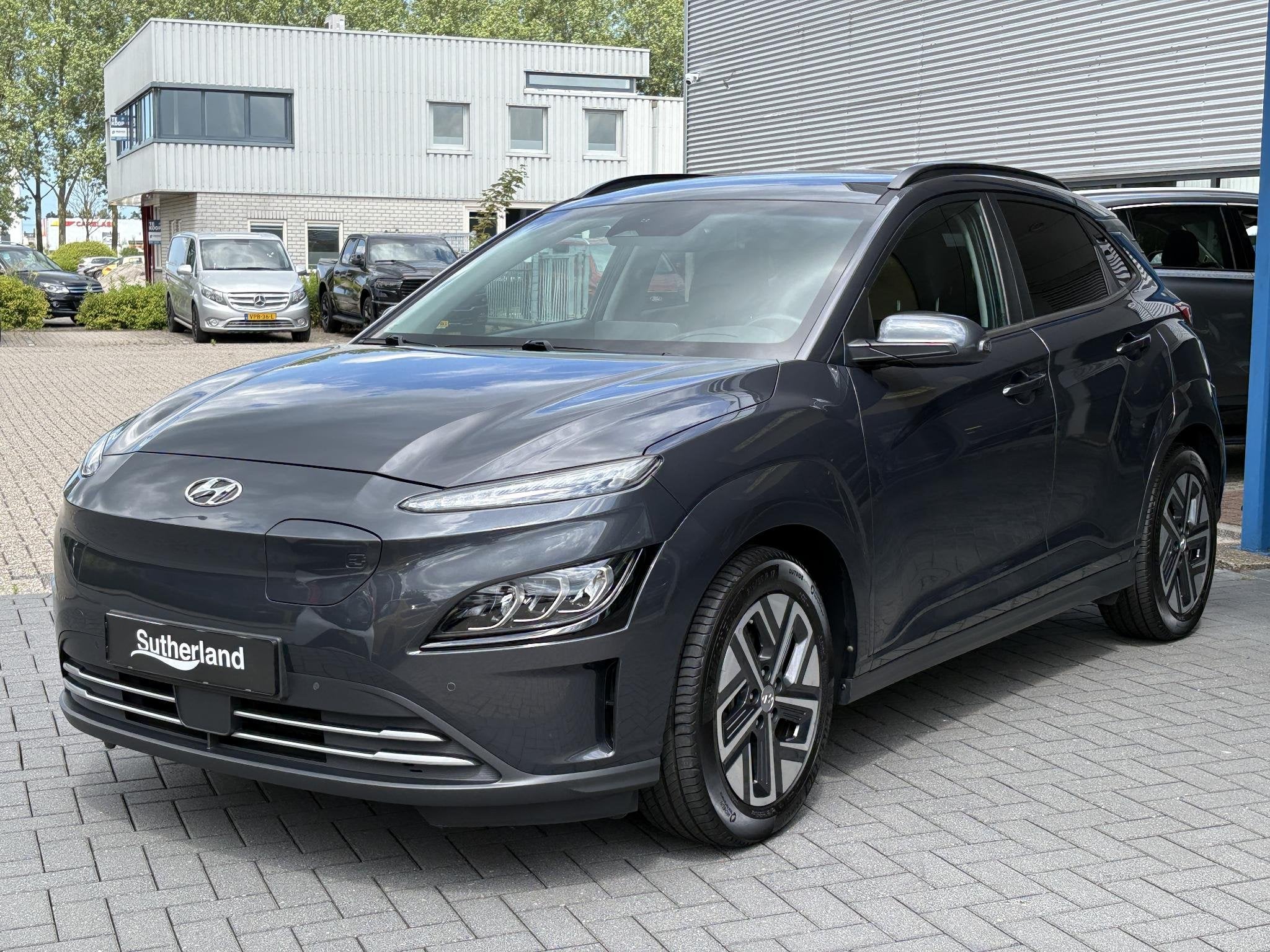Hyundai Kona EV Fashion 64 kWh | SOH 95% | Head-Up | Krell A, Dealer onderhouden, Stof, Gebruikt, Automatische klimaatregeling