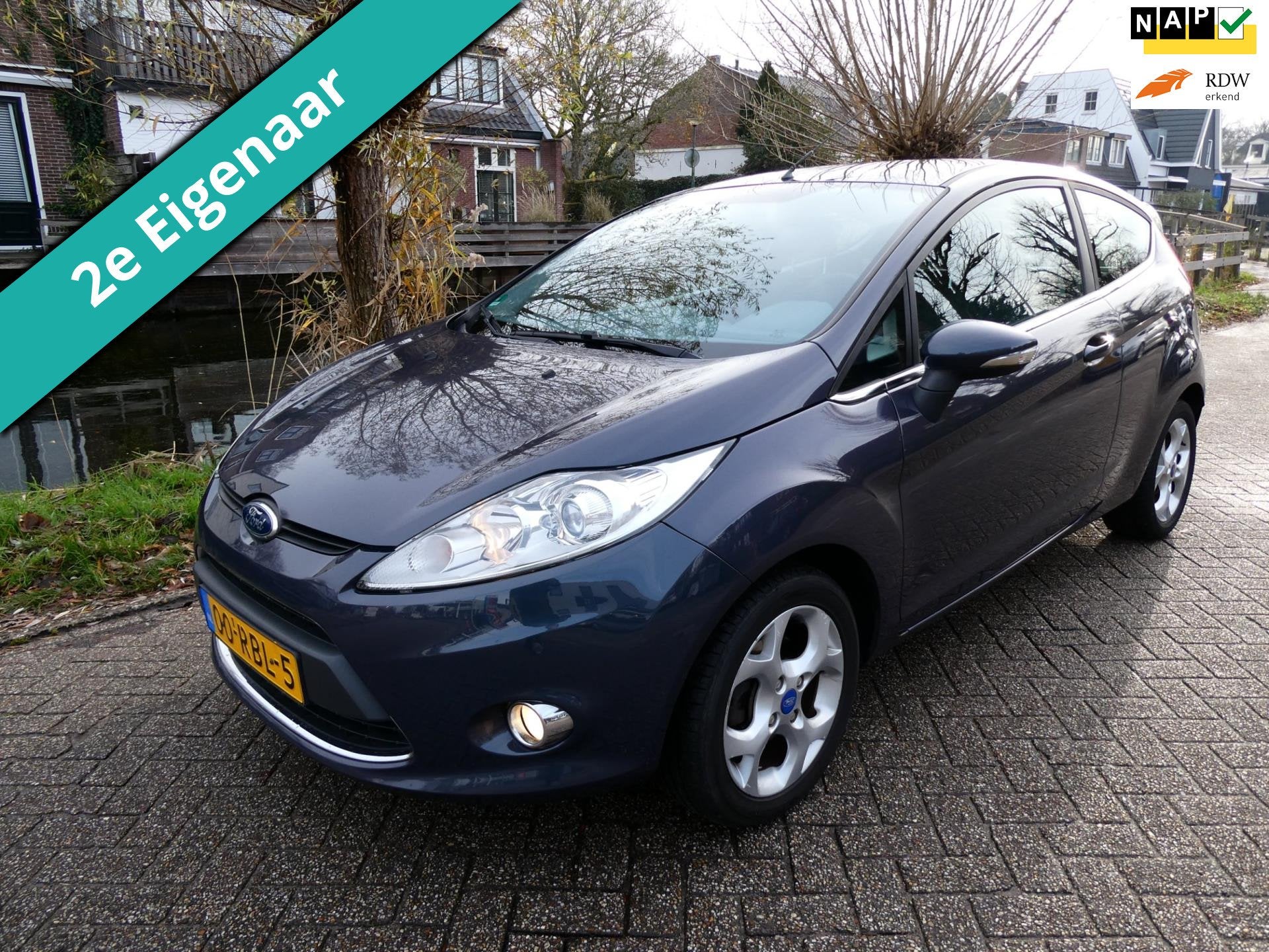 Ford Fiesta 1.4 Titanium 2e eigenaar 97pk 3-deurs Airco Trek, Voorwielaandrijving, Euro 5, Stof, Gebruikt