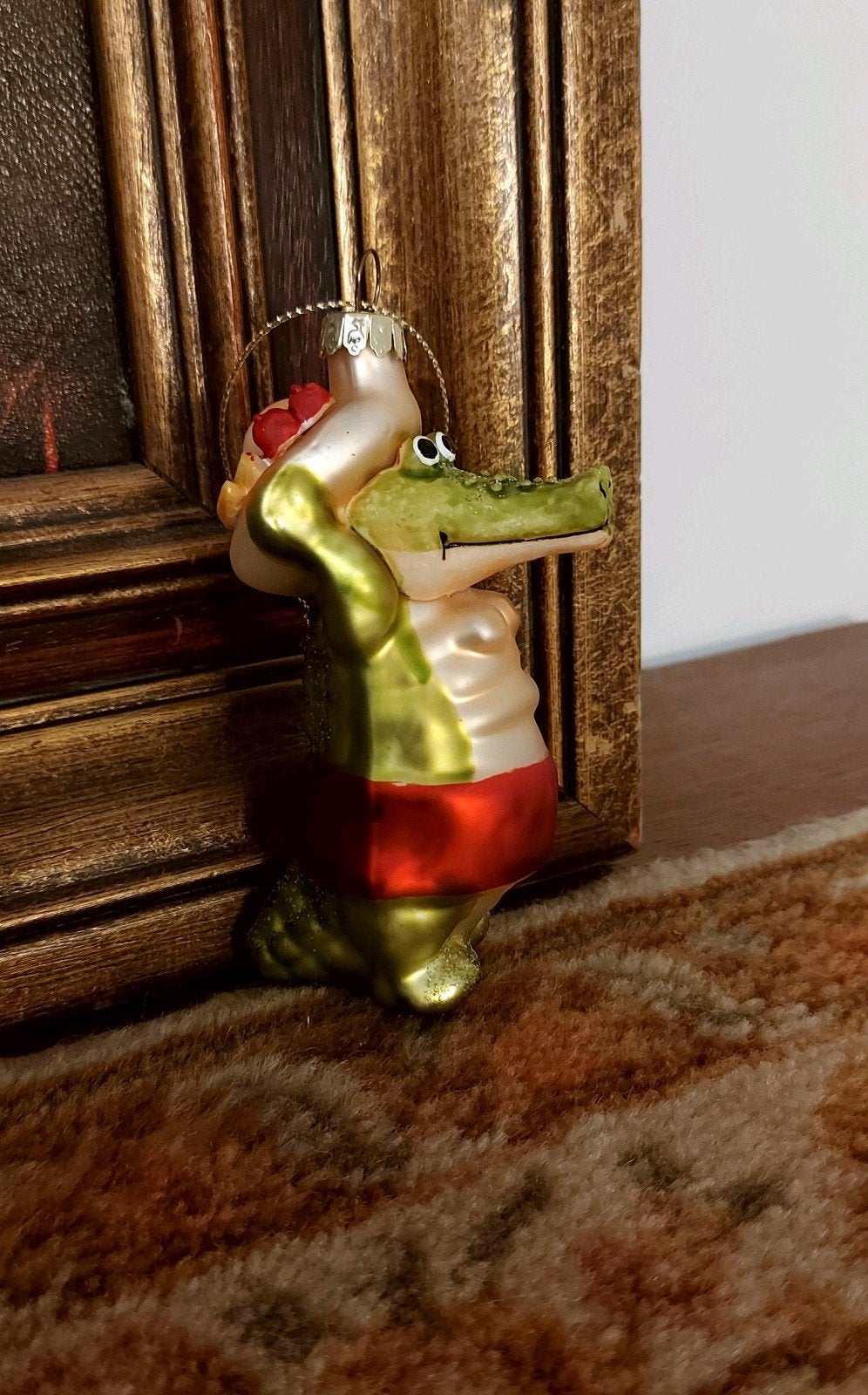 Kerstbal Krokodil, Ophalen