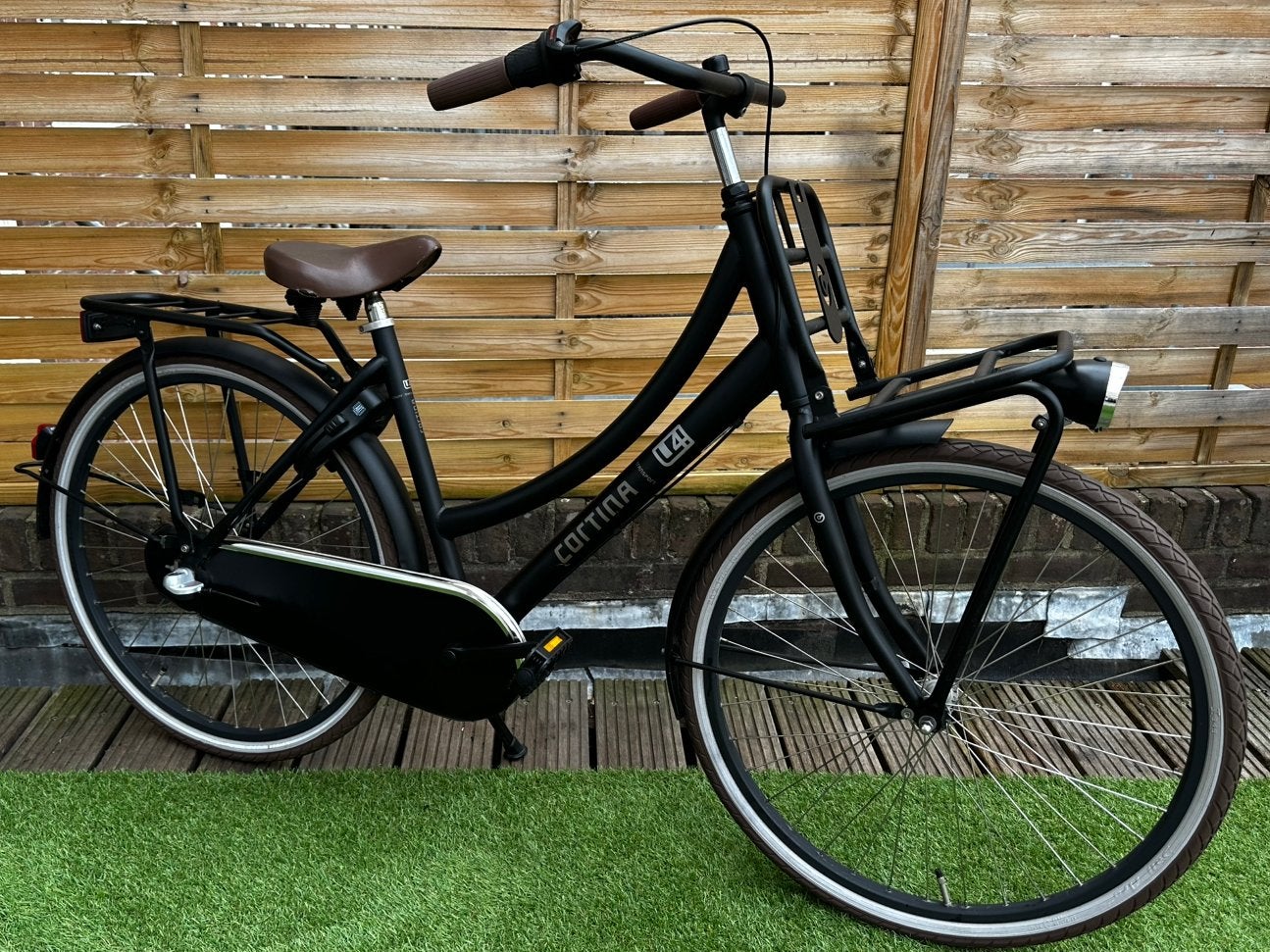 Cortina U4 26 Inch Meisjesfiets - Nexus 3 - Matt Zwart, Terugtraprem, Cortina U4 transportfiets, Versnellingen, Zo goed als nieuw