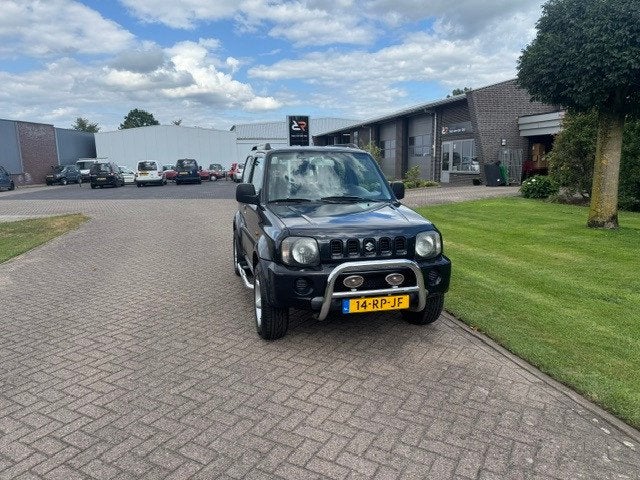 Suzuki Jimny 1.3 JLX 4x4 AIRCO, Auto's, 4 stoelen, Zwart, Origineel Nederlands, Bedrijf