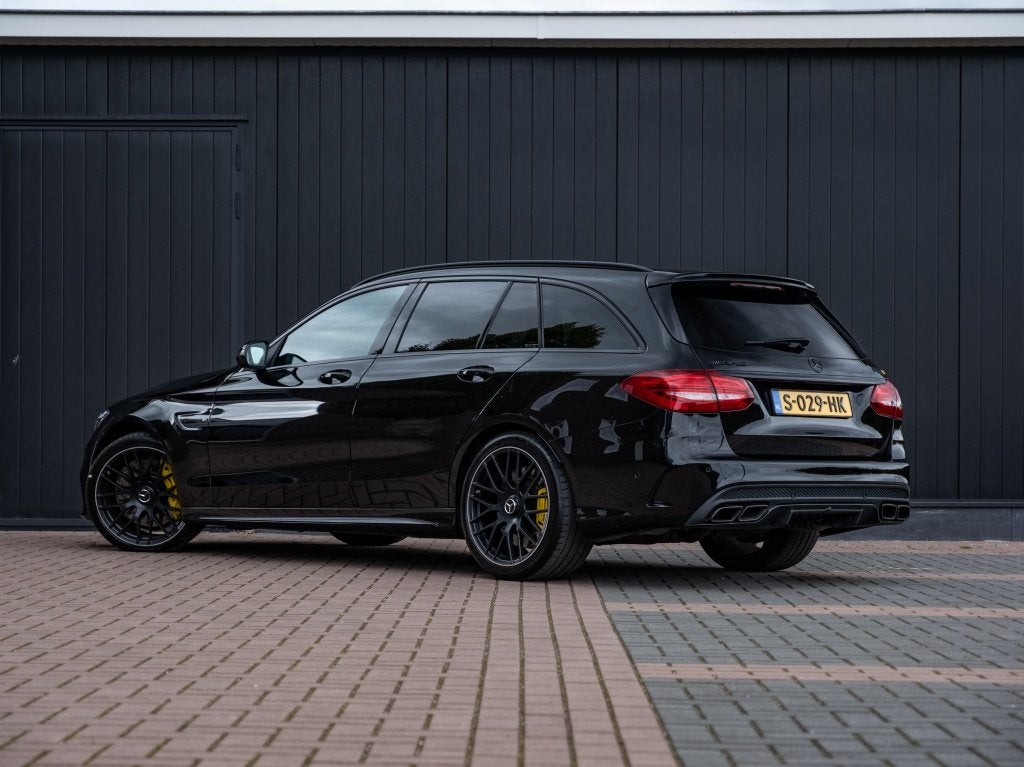 Mercedes-Benz C-Klasse Estate AMG 63 Estate V8 BiTurbo, Auto's, Zwart, Leder, Verwarmde buitenspiegels, 102 €/maand