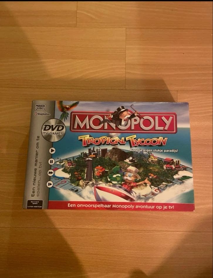 Monopoly Tropica Tycoon DVD TV Game - Zo goed als nieuw, Hobby en Vrije tijd, Gezelschapsspellen | Bordspellen, Zo goed als nieuw