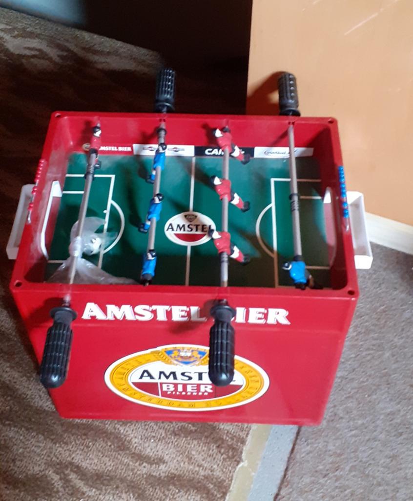 Amstelbier krat met voetbal spel er op, Ophalen of Verzenden