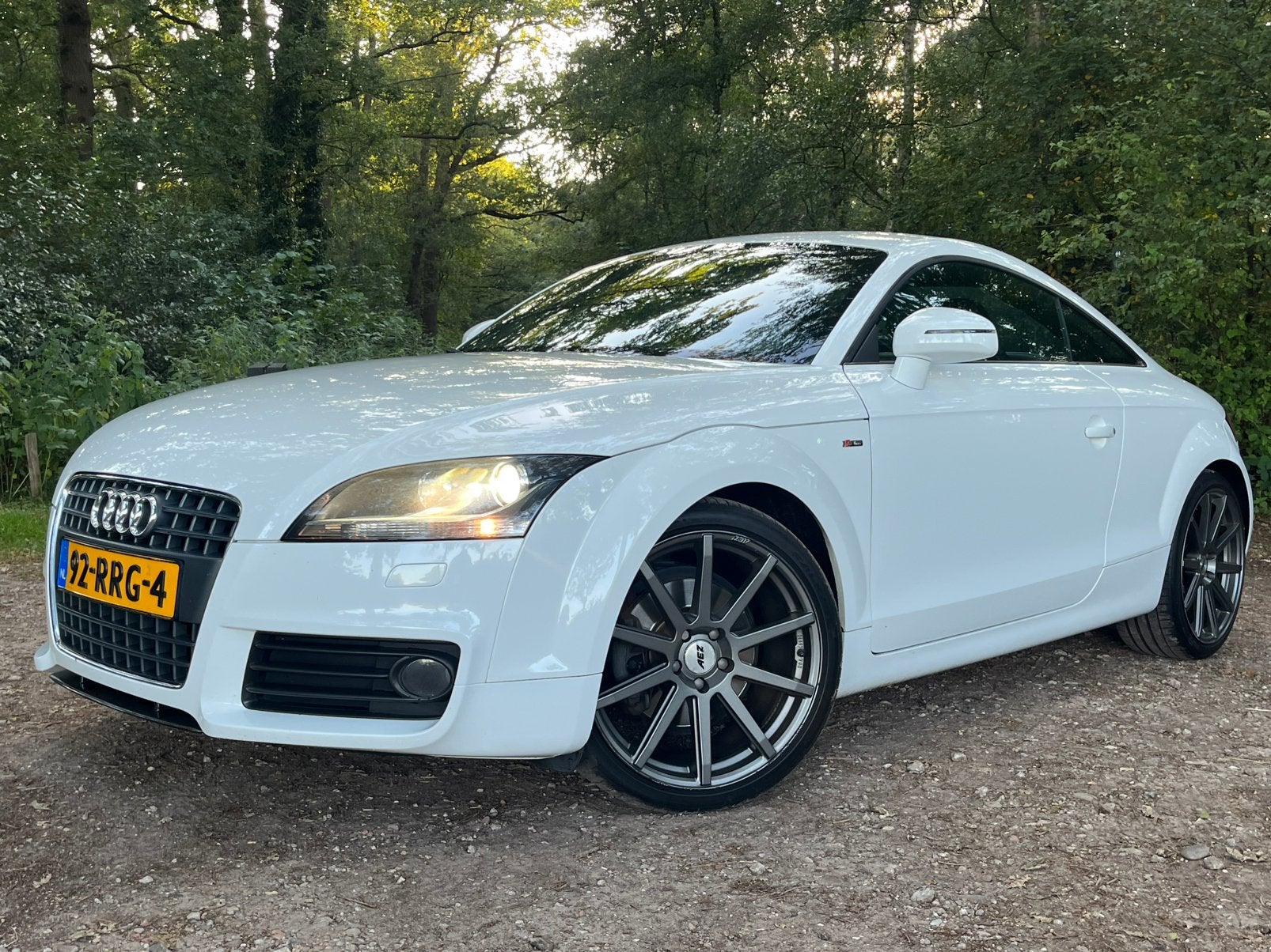 Audi TT 2.0 TFSI 200pk H6 Coupé S-Line Xenon Bose Clima, TT, Zwart, 4 cilinders, 1984 cc