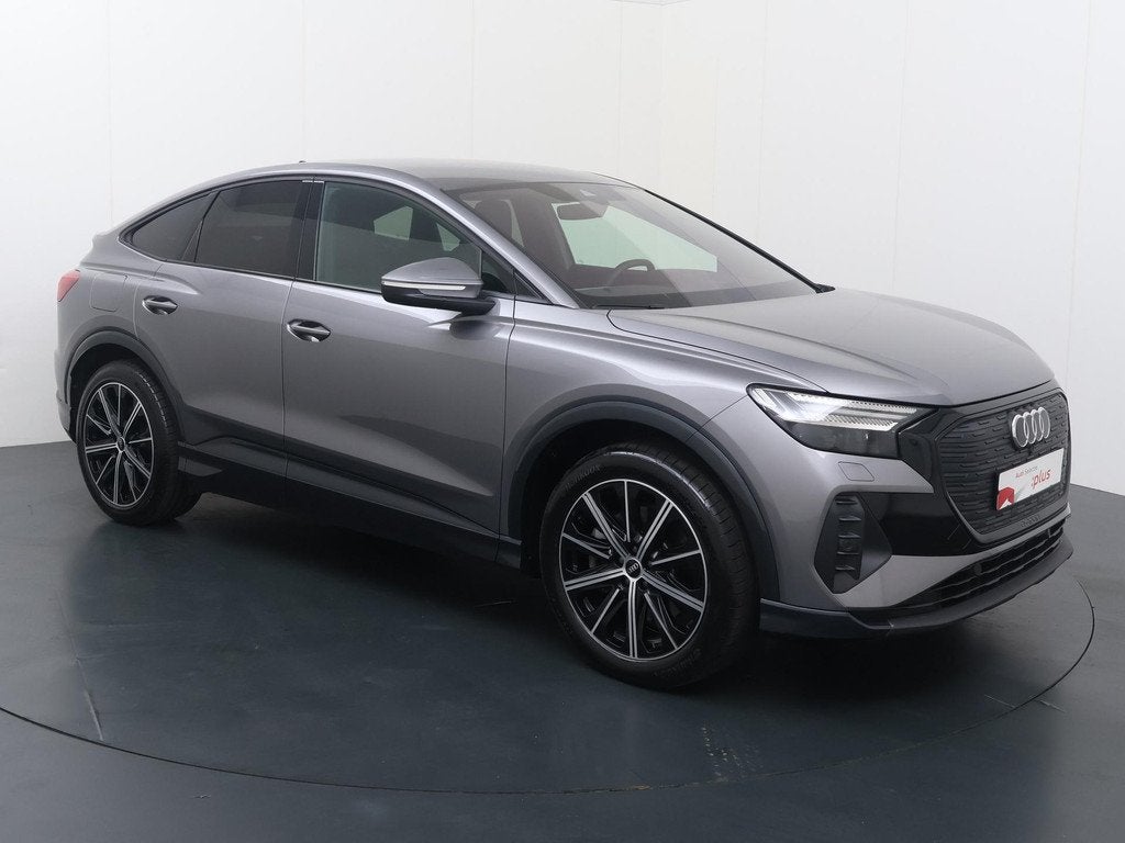 Audi Q4 Sportback e-tron 55 quattro Advanced edition 82 kWh, Auto's, Audi, 12 maanden, Stof, Gebruikt, Zwart