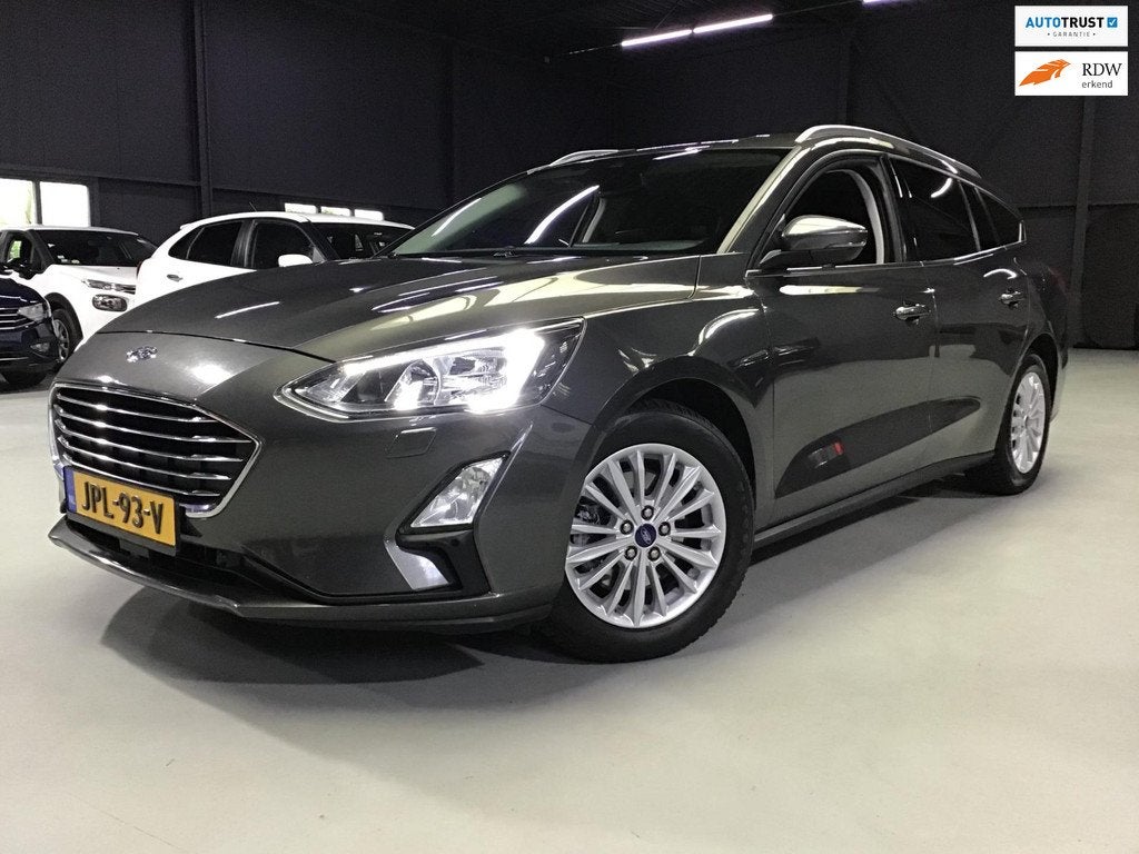 Ford Focus Wagon 1.0 EcoBoost Titanium X Business I 1e Eigen, 1328 kg, Gebruikt, Euro 6, Grijs