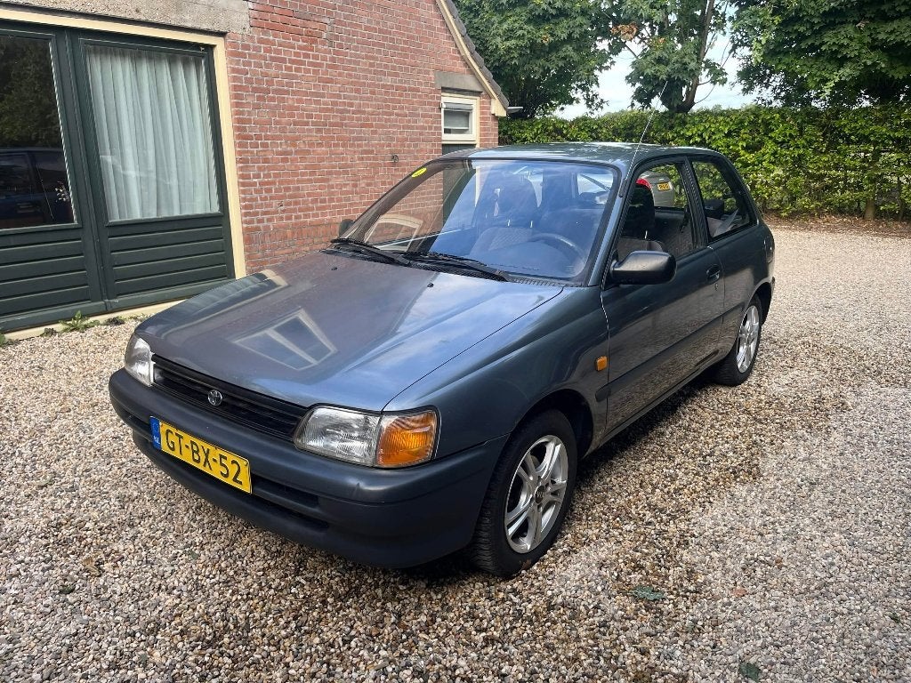 Toyota Starlet 1.3 XLI 12V E2 1993 Grijs APK juli '28, Auto's, Toyota, Stof, 4 cilinders, Origineel Nederlands, Handgeschakeld