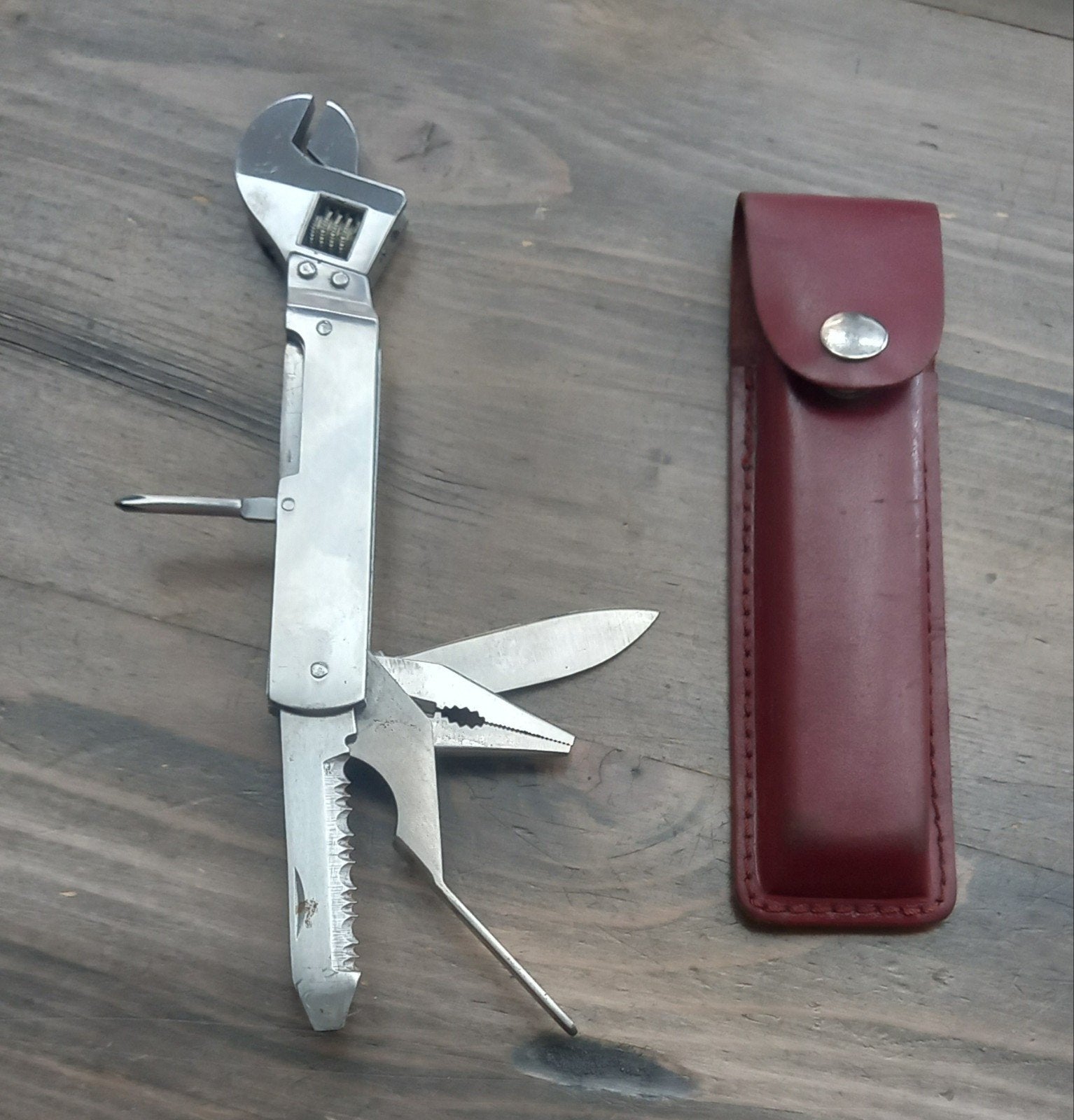 Multitool met 6 functies en lederen etui, Ophalen of Verzenden, Gebruikt