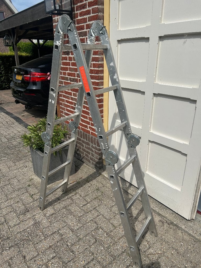 Aluminium vouwladder in 4 delen met 3 sporten, Doe-het-zelf en Verbouw, Ladders en Trappen, Ophalen, Zo goed als nieuw, Ladder