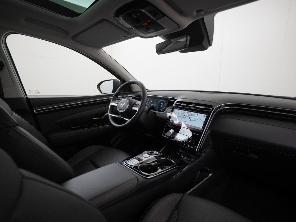 Hyundai Tucson 1.6 T-GDI PHEV Premium Sky 4WD | Panoramadak, Auto's, Hyundai, 12 maanden, 14 kWh, Gebruikt, Euro 6