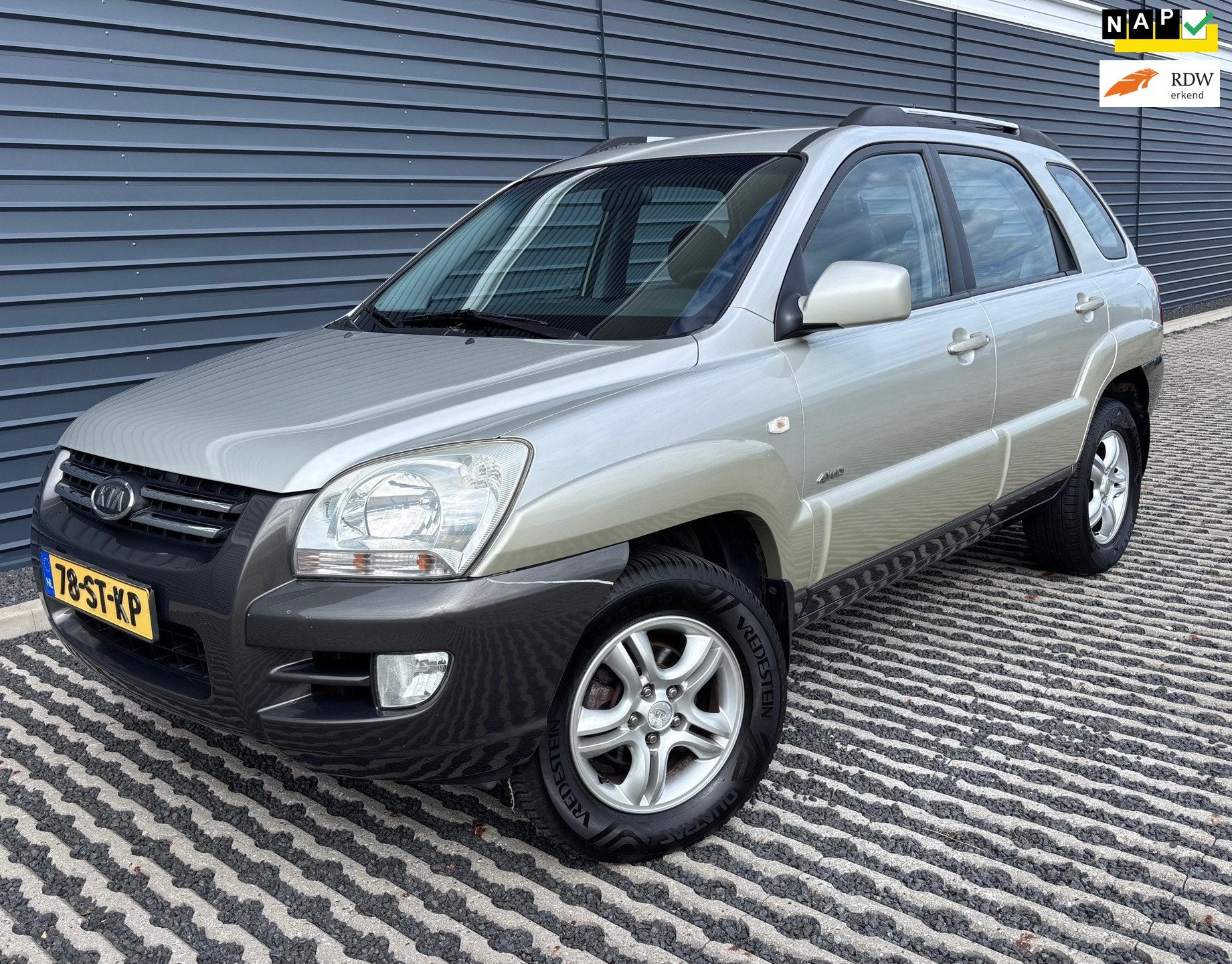 Kia Sportage 2.0 CVVT Comfort | 4x4 4WD | Climate control, Auto's, Gebruikt, Zwart, 4 cilinders, Leder en Stof