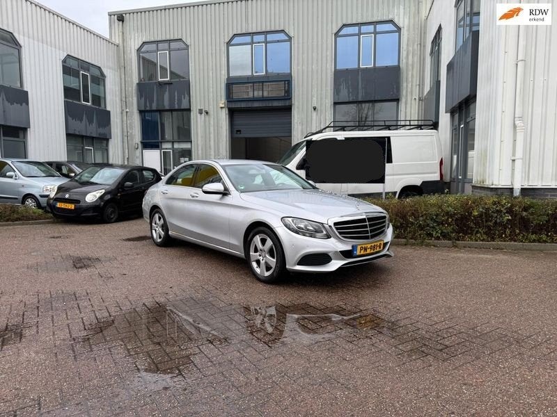 Mercedes-Benz C-Klasse C180 1.6 115KW 2014 Grijs, Auto's, Mercedes-Benz, Achterwielaandrijving, 1595 cc, Handgeschakeld, Grijs