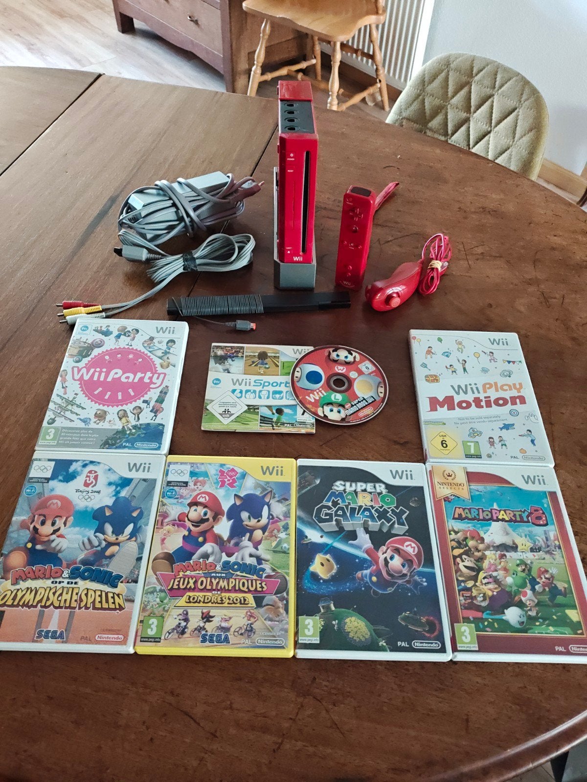 Nintendo Wii 25th Anniversary Editie Rood met mooie games., Spelcomputers en Games, Ophalen of Verzenden, Gebruikt, Met 1 controller