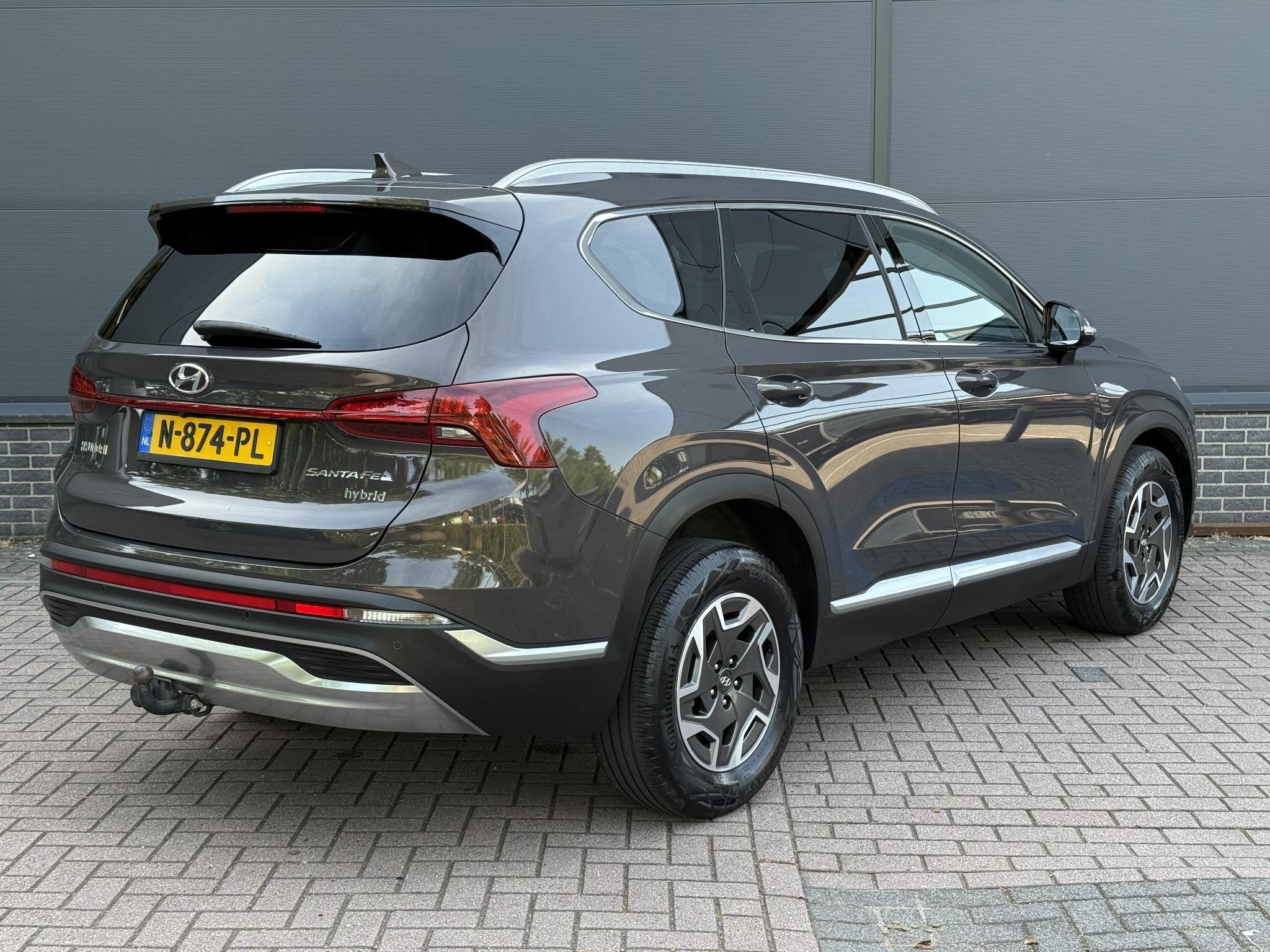 Hyundai Santa Fe 1.6 T-GDI HEV Comfort Smart / Dealer Onderh, Auto's, Santa Fe, Euro 6, 4 cilinders, Bruin