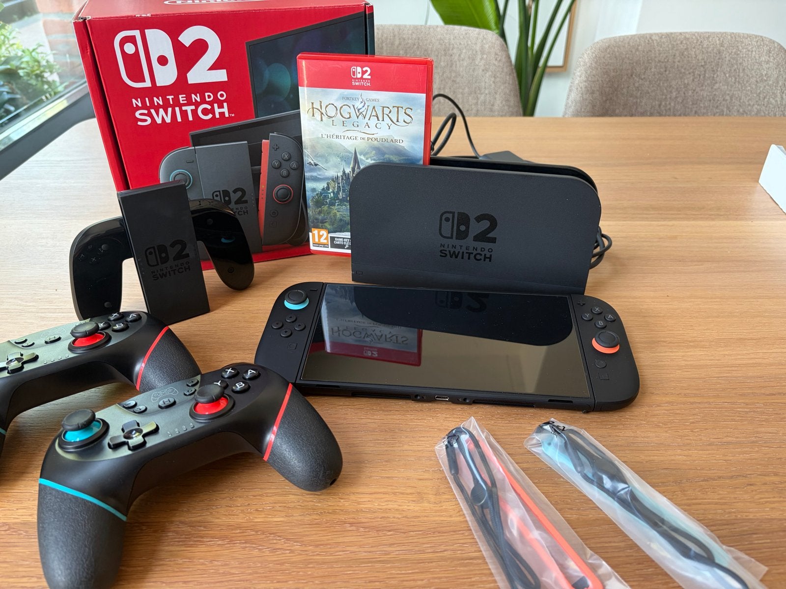 Nintendo Switch 2 - 2 controllers, Hogwarts Legacy en case., Ophalen, Zo goed als nieuw, Met 2 controllers, Met games