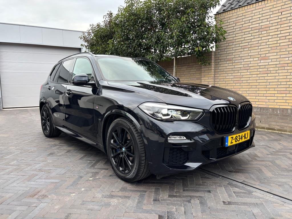 BMW X5 XDrive45e Carbon zwart M-pakket PANORAMA 394 pk, Auto's, Dealer onderhouden, Gebruikt, Zwart, Vierwielaandrijving