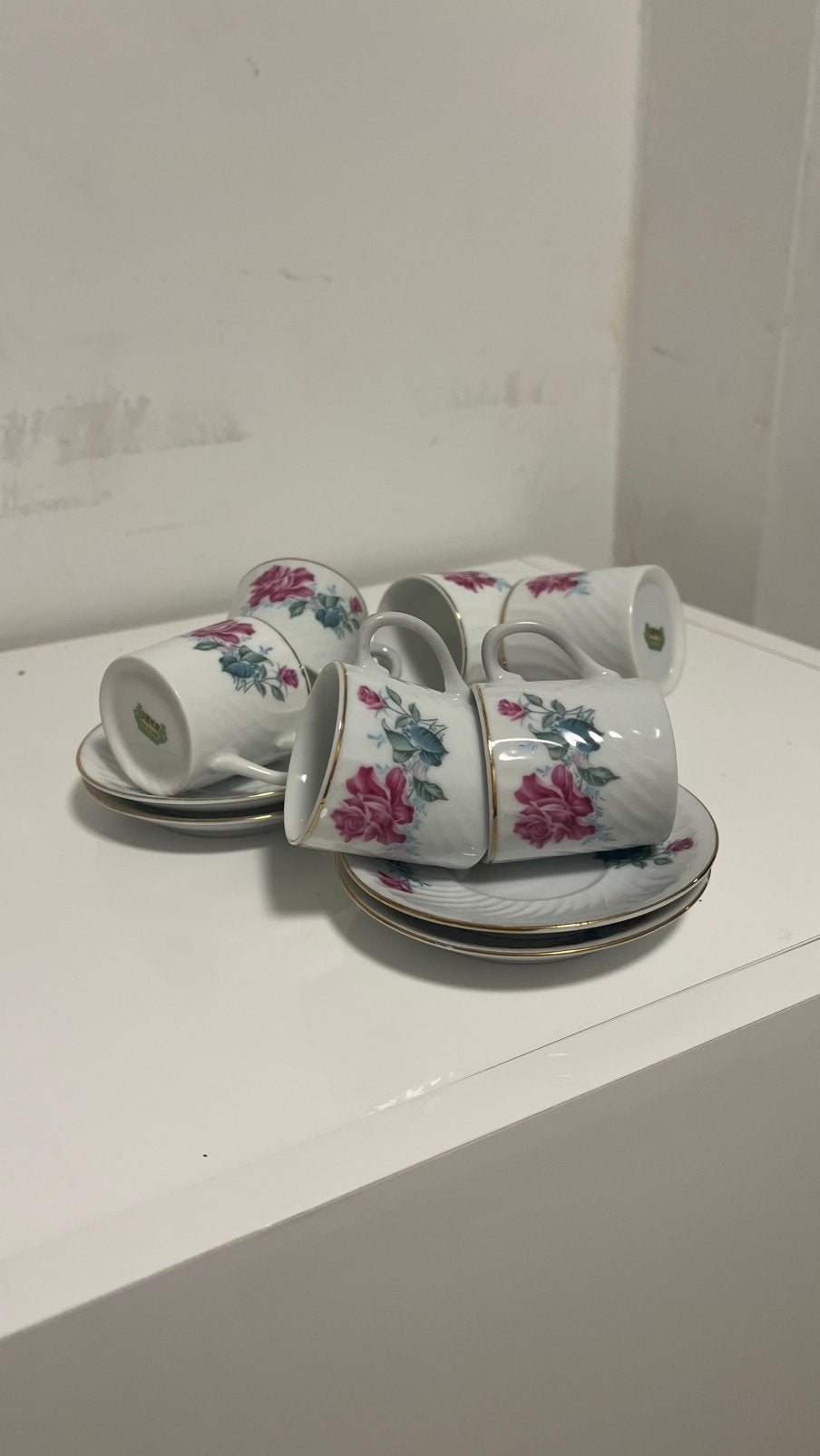 Koffie kopjes met schotel, Ophalen