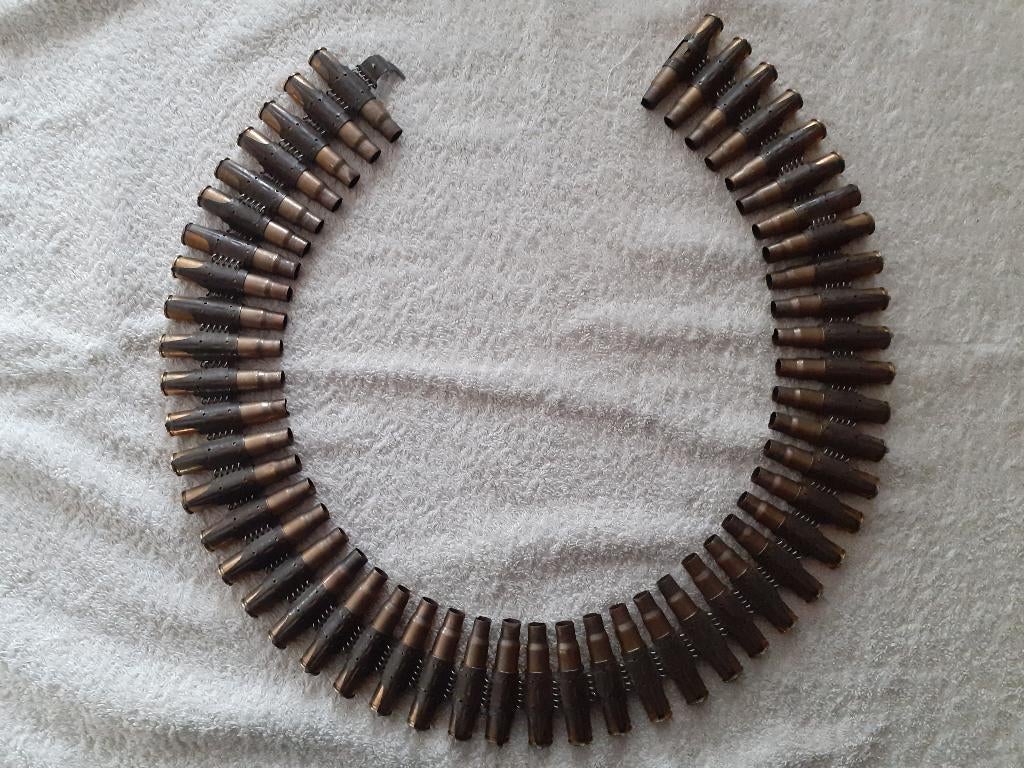 Hulzenband MG Duits(ONKLAAR) messing, Ophalen of Verzenden, Landmacht, Duitsland, Hulzen of Bodemvondsten