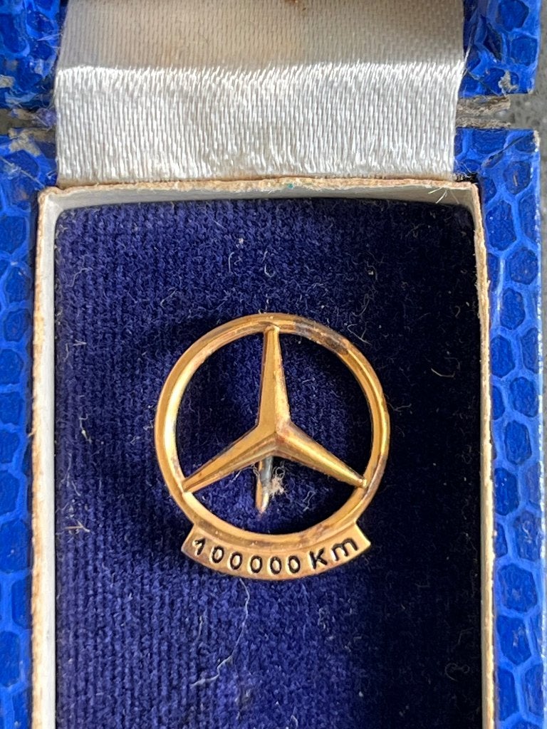 Mercedes rever-speldje 100.000 km, Ophalen of Verzenden
