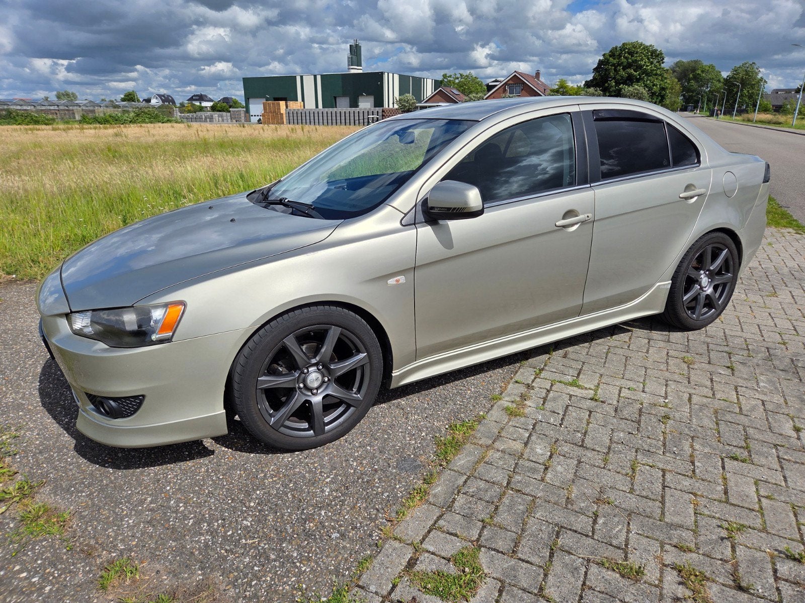 Mitsubishi Lancer 1.8 Mivec Sports Sedan 2009, Auto's, 1295 kg, Beige, Origineel Nederlands, Handgeschakeld