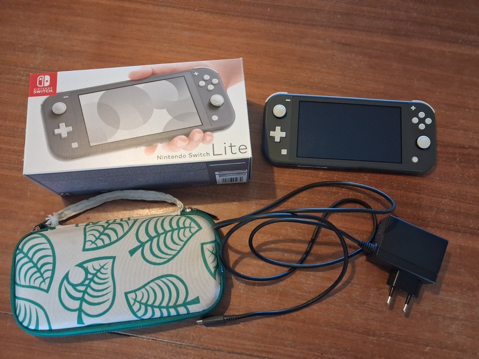 Nintendo Switch Lite met hoes en oplader, Ophalen of Verzenden, Grijs, Zo goed als nieuw, Met beschermhoes of tas
