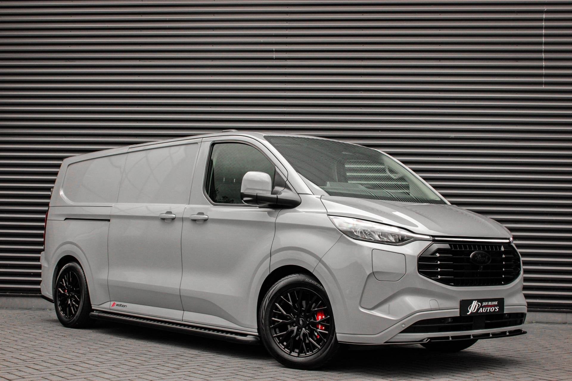 Ford E-Transit Cust. 340 L2H1 Limited 65 kWh 218PK / JB-EDII, Auto's, Bestelauto's, Automaat, Achterwielaandrijving, 324 km, Zwart
