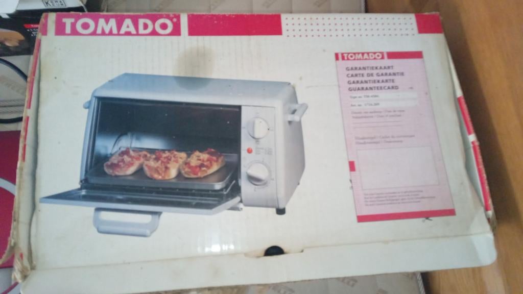Tomado snack.oven, Ophalen