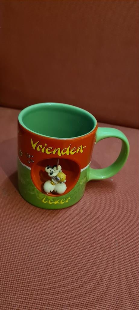 Diddle drink mok met Diddle figuurtje erin die kan draaien., Ophalen of Verzenden, Gebruikt