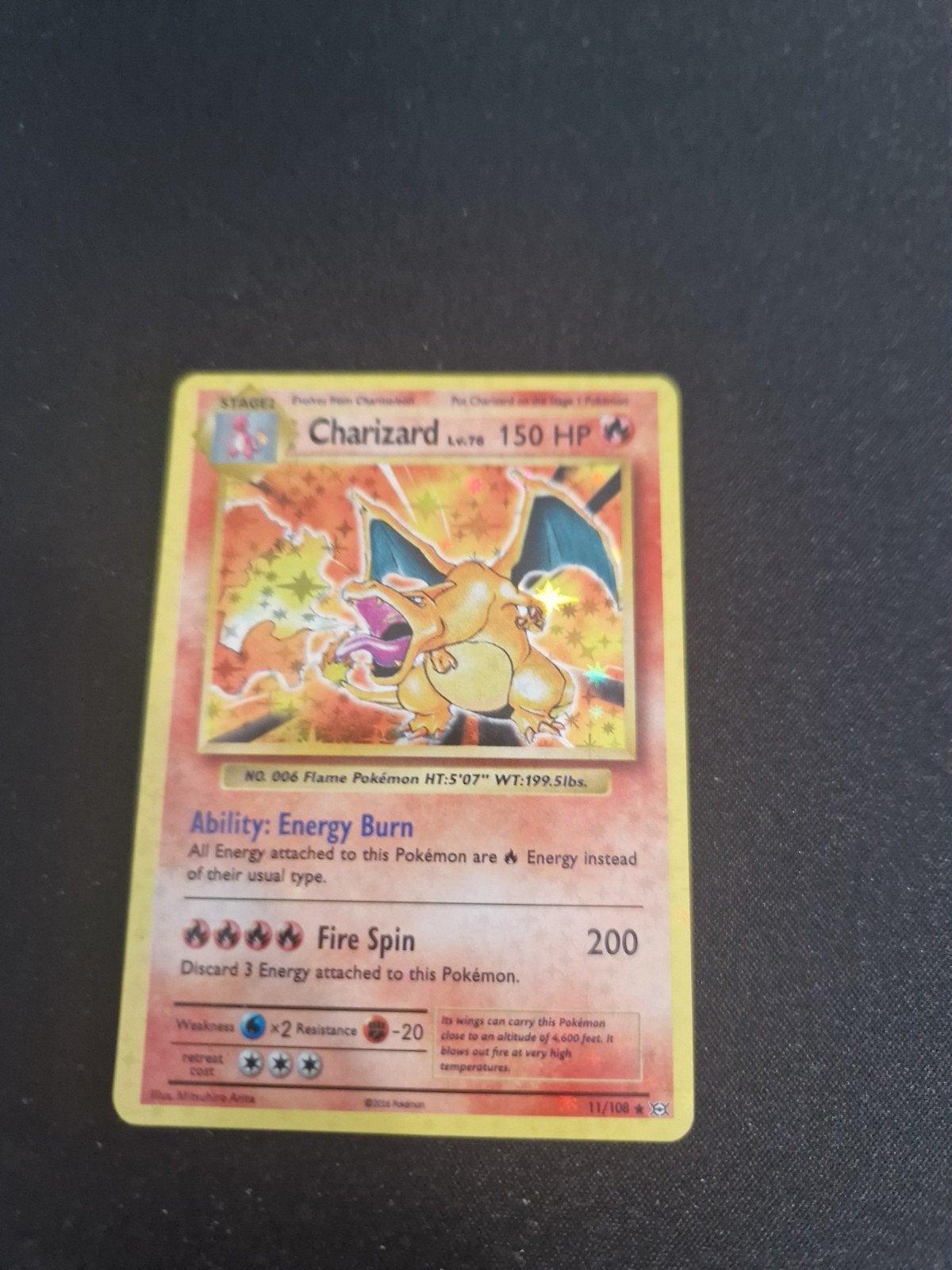 Charizard Pokémon kaart uit 2016 - Uniek en licht beschadigd, Hobby en Vrije tijd, Verzamelkaartspellen | Pokémon, Ophalen, Gebruikt