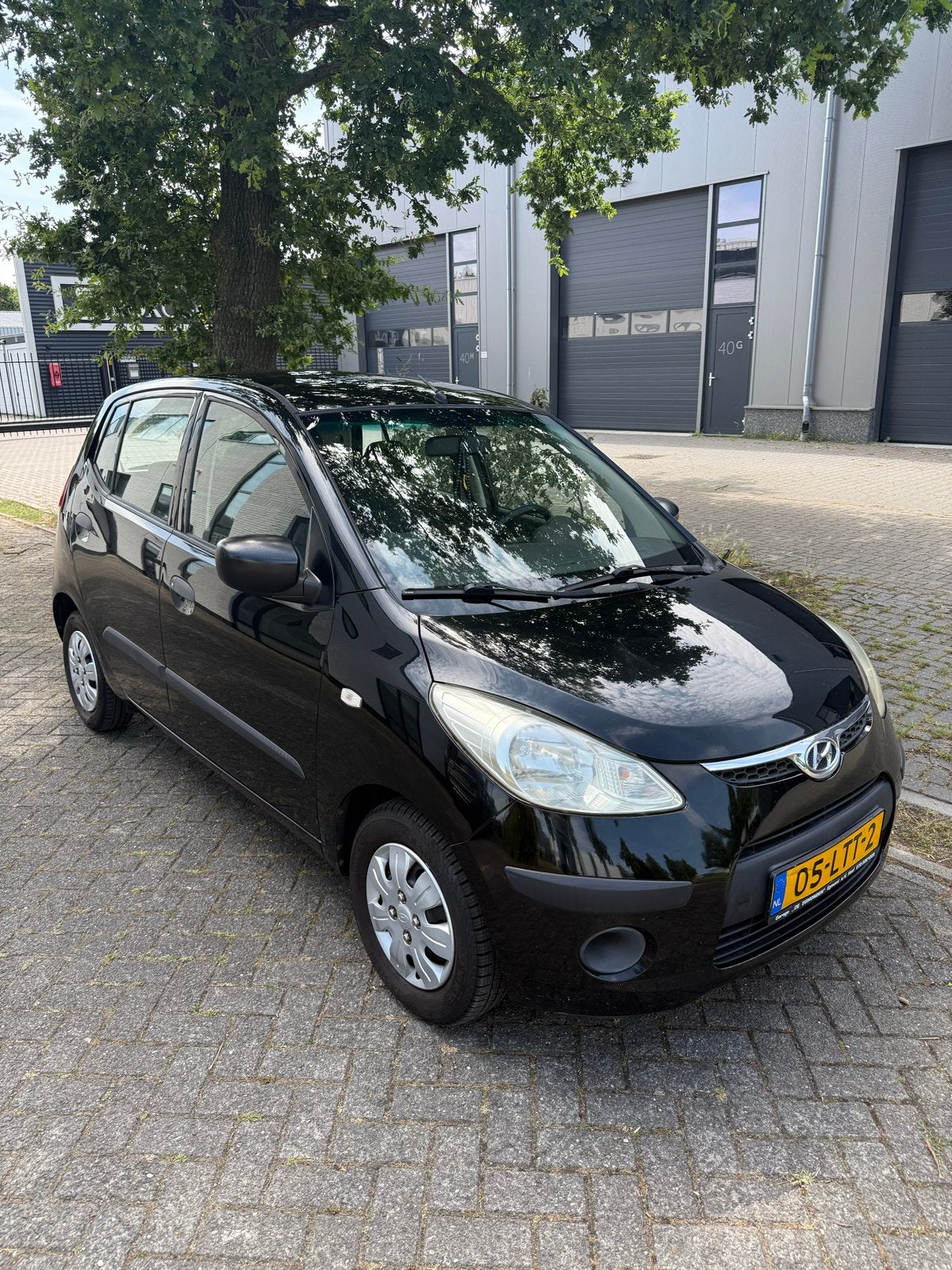 Hyundai i10 1.1 I 5DR 2010 Zwart met nieuwe apk, Auto's, Stof, 4 cilinders, 400 kg, Zwart
