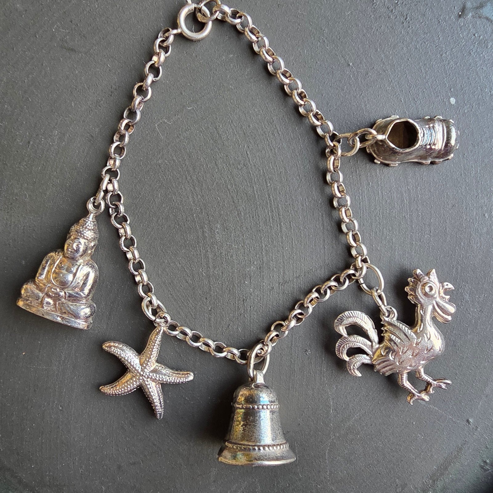 Zilveren bedelarmband met diverse bedels, Gebruikt, Ophalen of Verzenden, Met bedels of kralen, Zilver