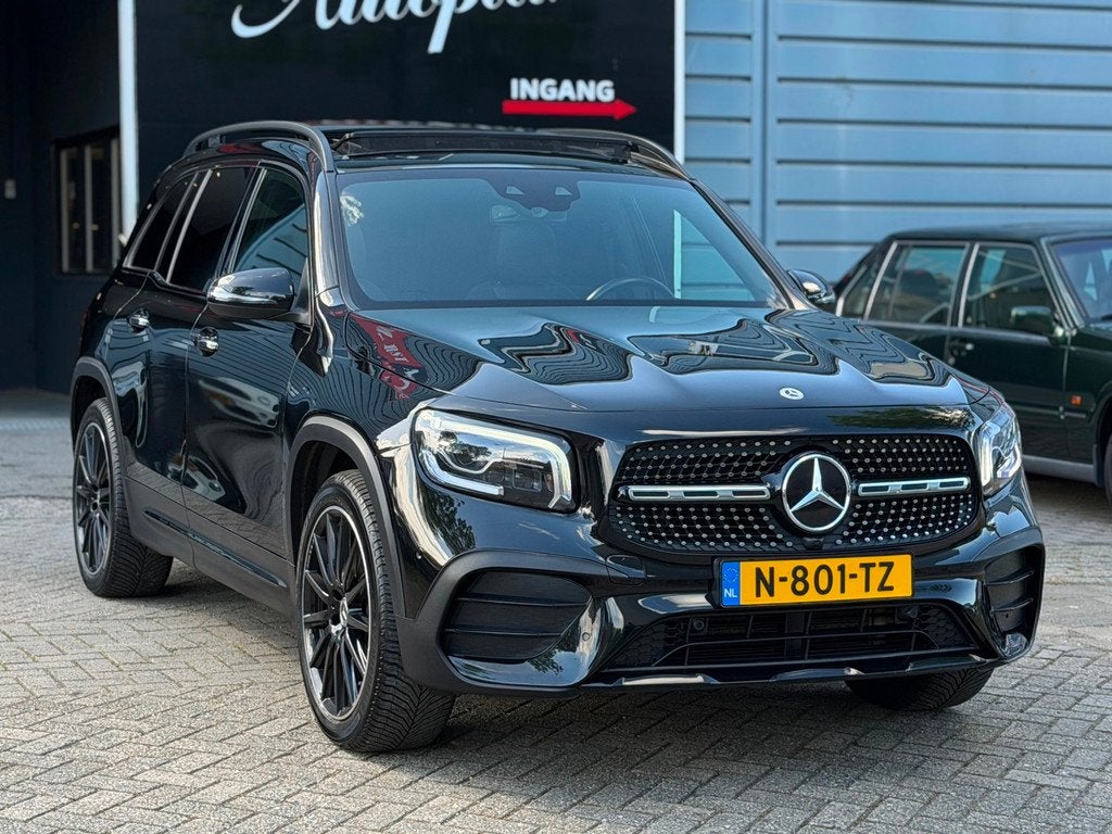 Mercedes-Benz GLB 200 Business Solution AMG-line PANO|MEMORY, Auto's, Mercedes-Benz, 4 cilinders, Leder en Stof, Origineel Nederlands