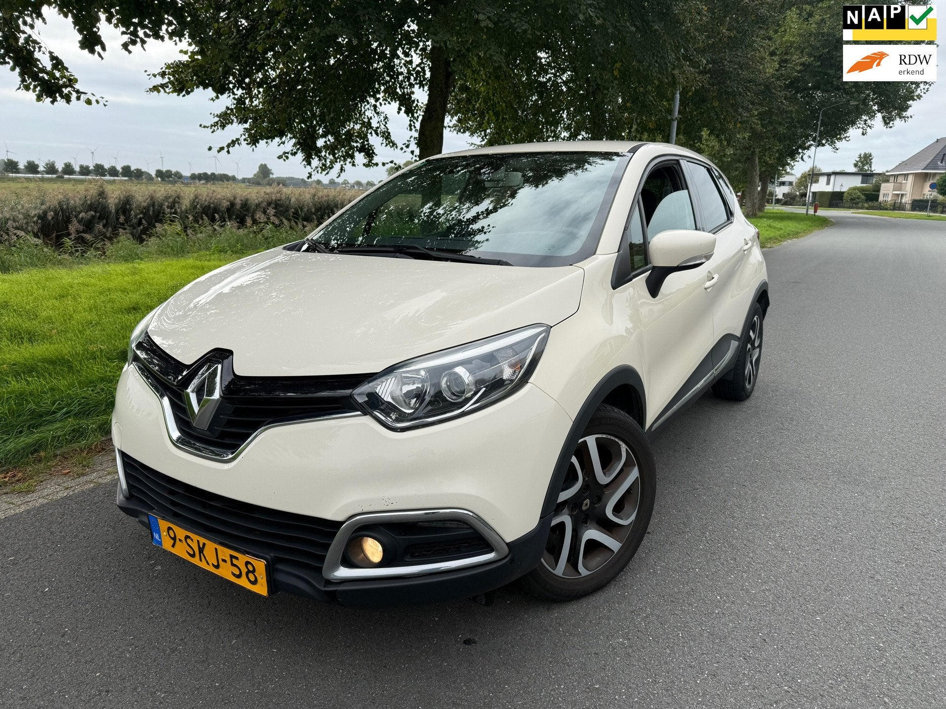 Renault Captur 0.9 TCe Dynamique CLIMA/CRUISE/NAVI/VELGEN, Auto's, Voorwielaandrijving, Stof, Gebruikt, Zwart