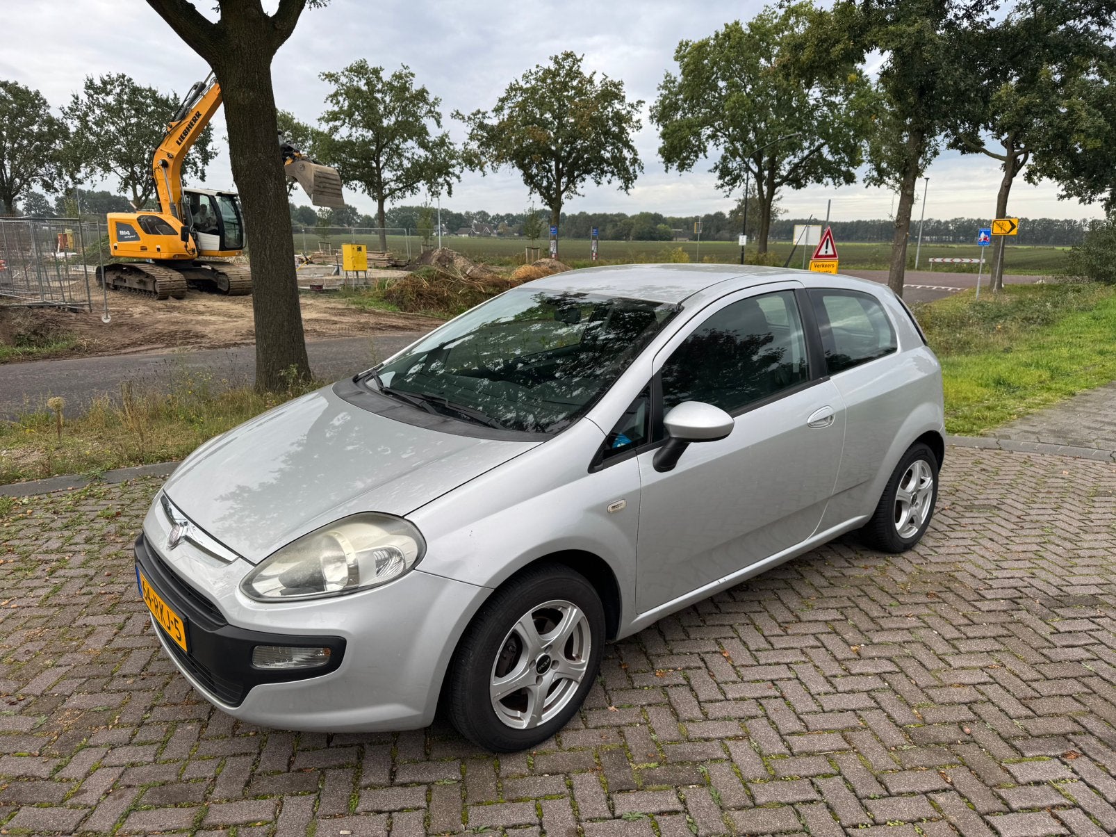 Fiat Punto Evo 1.2 2011 AIRCO/CRUISE/1ste eigenaar, Dealer onderhouden, Stof, 40 €/maand, 1242 cc