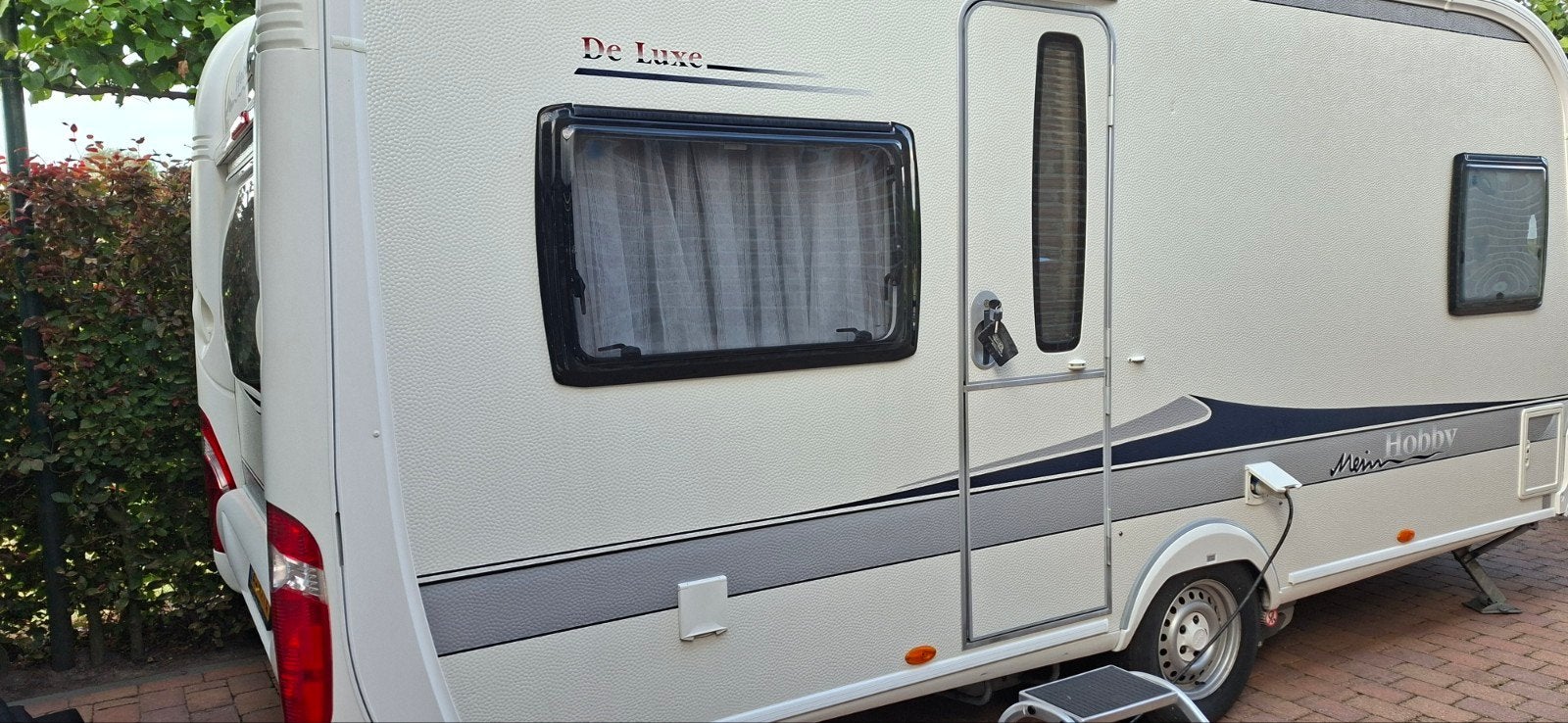 Hobby 460 ufe De Luxe met Isabella tent en isabella Luifel c, Rondzit, Hobby, Frans bed, 5 tot 6 meter