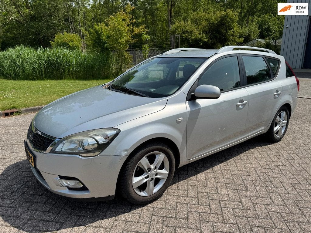 Kia Cee'd Sporty Wagon 1.4 CVVT Navigator Plus Pack NAVI CRU, Auto's, Kia, Voorwielaandrijving, Euro 5, Stof, Gebruikt