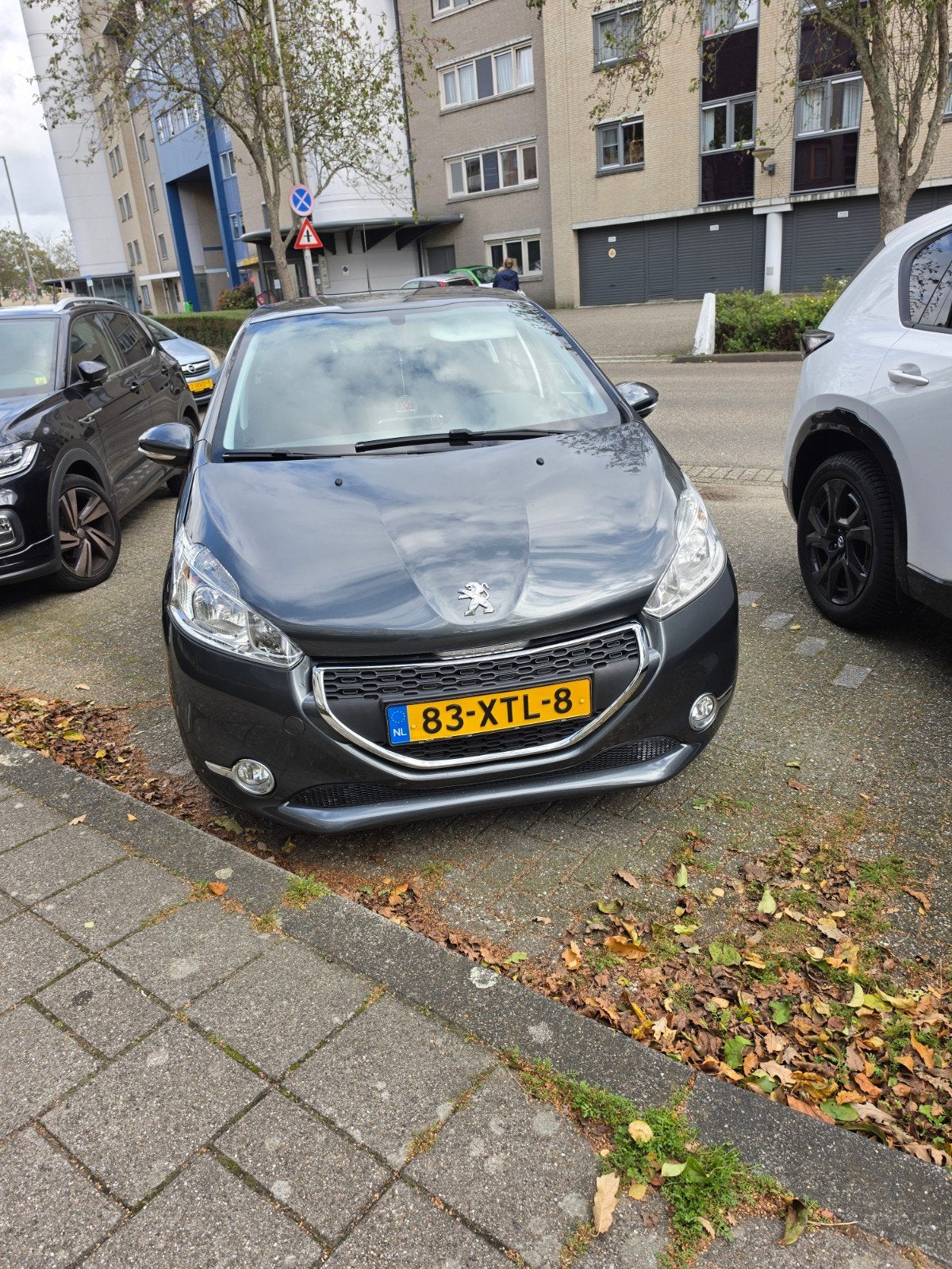 Peugeot 208 1.2 VTi 82PK 5D (102g) 2012 Grijs, Auto's, Voorwielaandrijving, Stof, 1199 cc, Origineel Nederlands