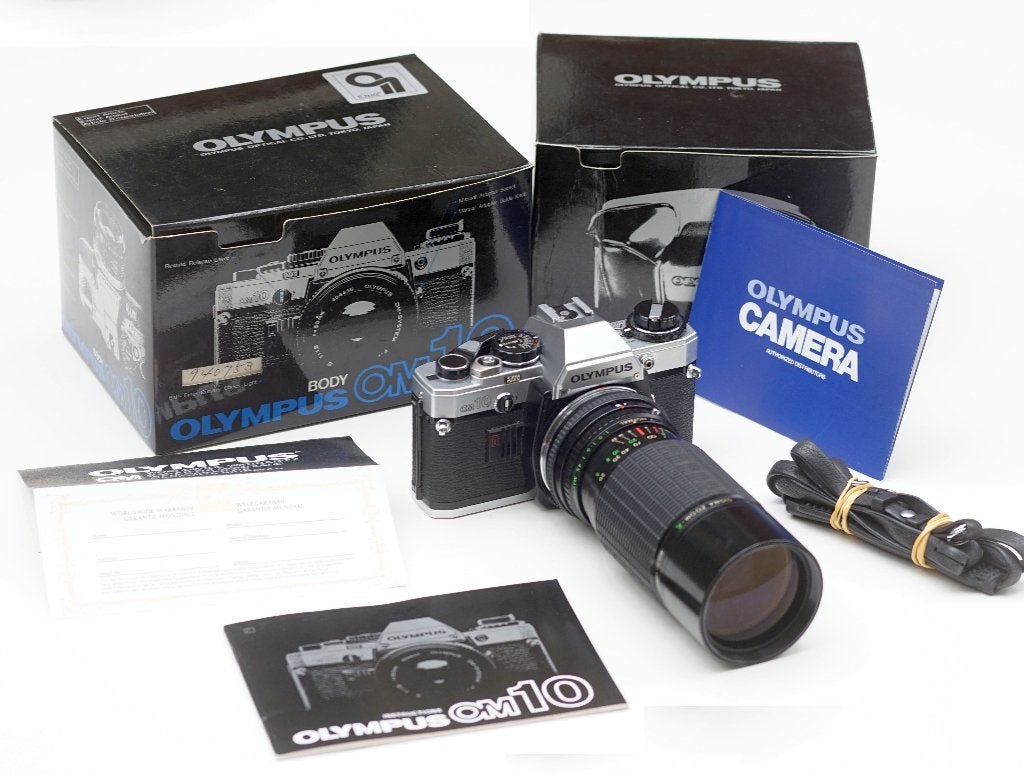 *Olympus OM10 (101812) met Sigma MC (880025) 100-200mm f/4.5, Ophalen of Verzenden, Compact, Overige Merken
