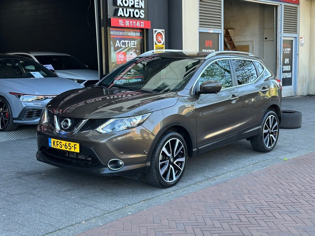 Nissan Qashqai 1.2 Acenta Automaat Leer Navi 360 Camera, Auto's, Nissan, Gebruikt, 4 cilinders, Bruin, 116 pk