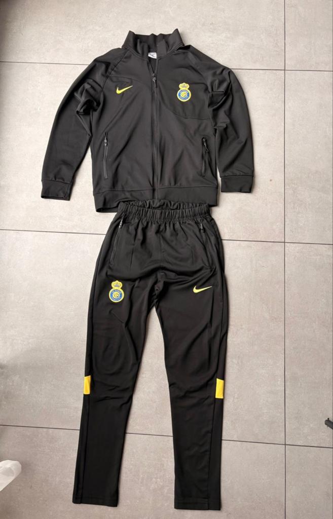 Nike trainingspak Al Nassr FC - Zwart/Geel, Kleding | Heren, Maat 48/50 (M), Zwart, Nike, Ophalen of Verzenden