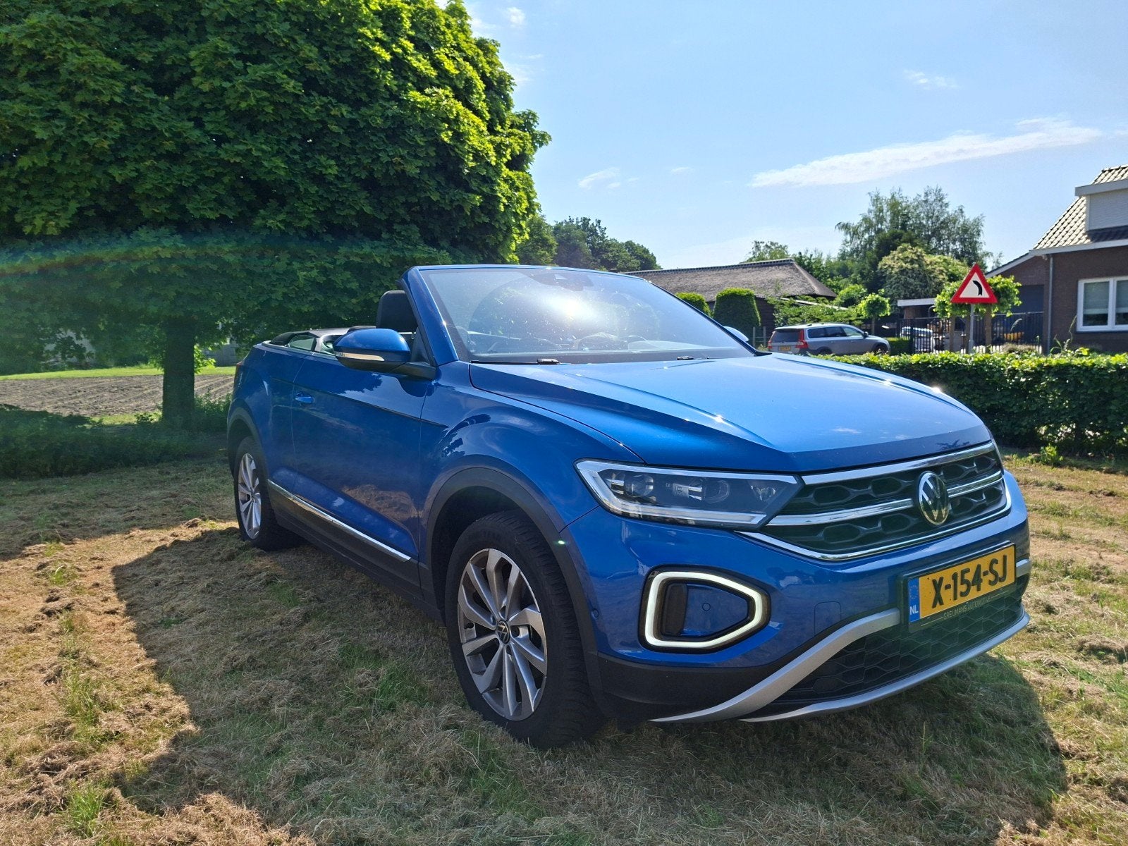 Volkswagen T-Roc 1.5 TSI 150pk 7-DSG 2023 Blauw, Auto's, 1498 cc, 4 cilinders, 1446 kg, 75 €/maand